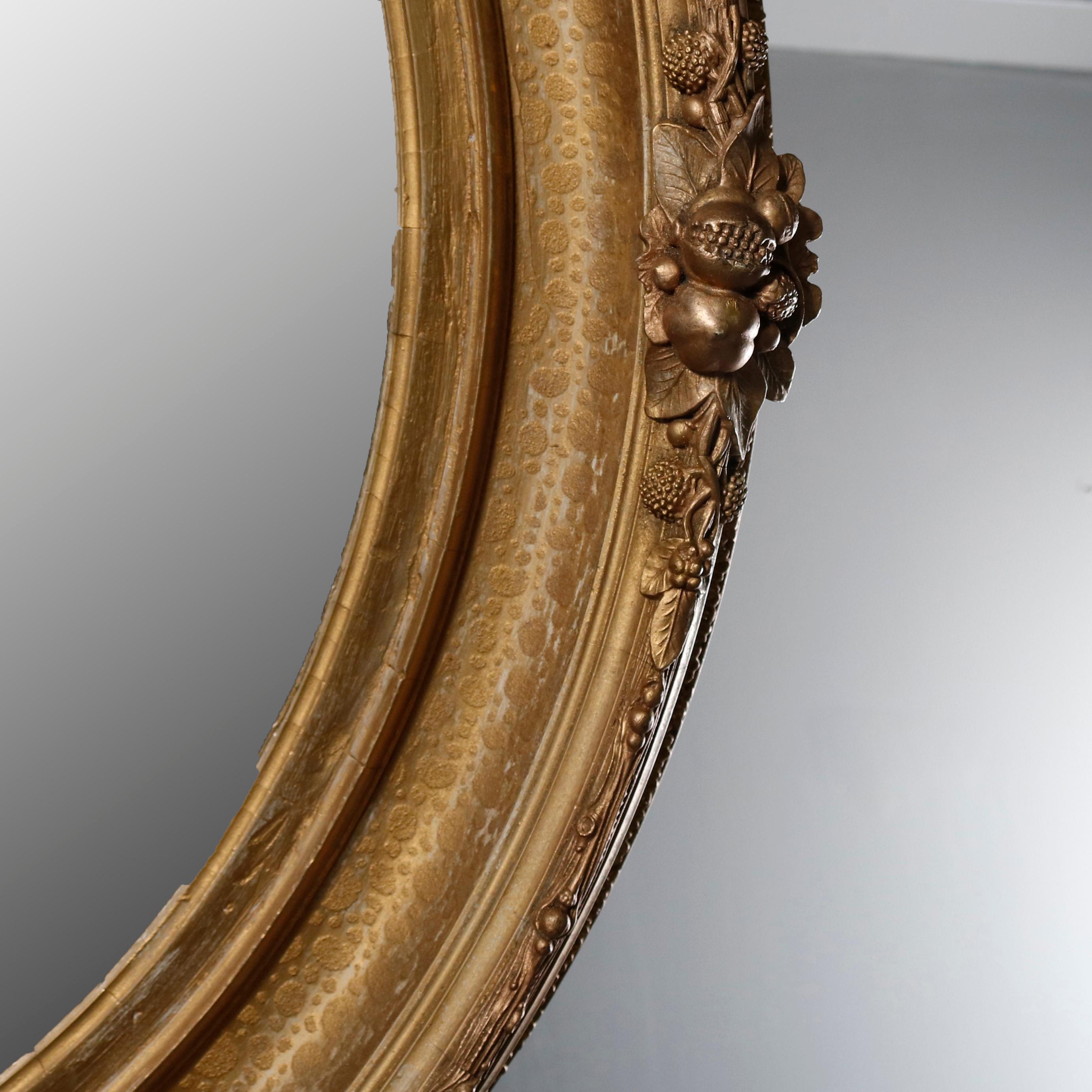 Pair of Large and Antique French Louis XIV Floral Giltwood Oval Wall Mirrors 3