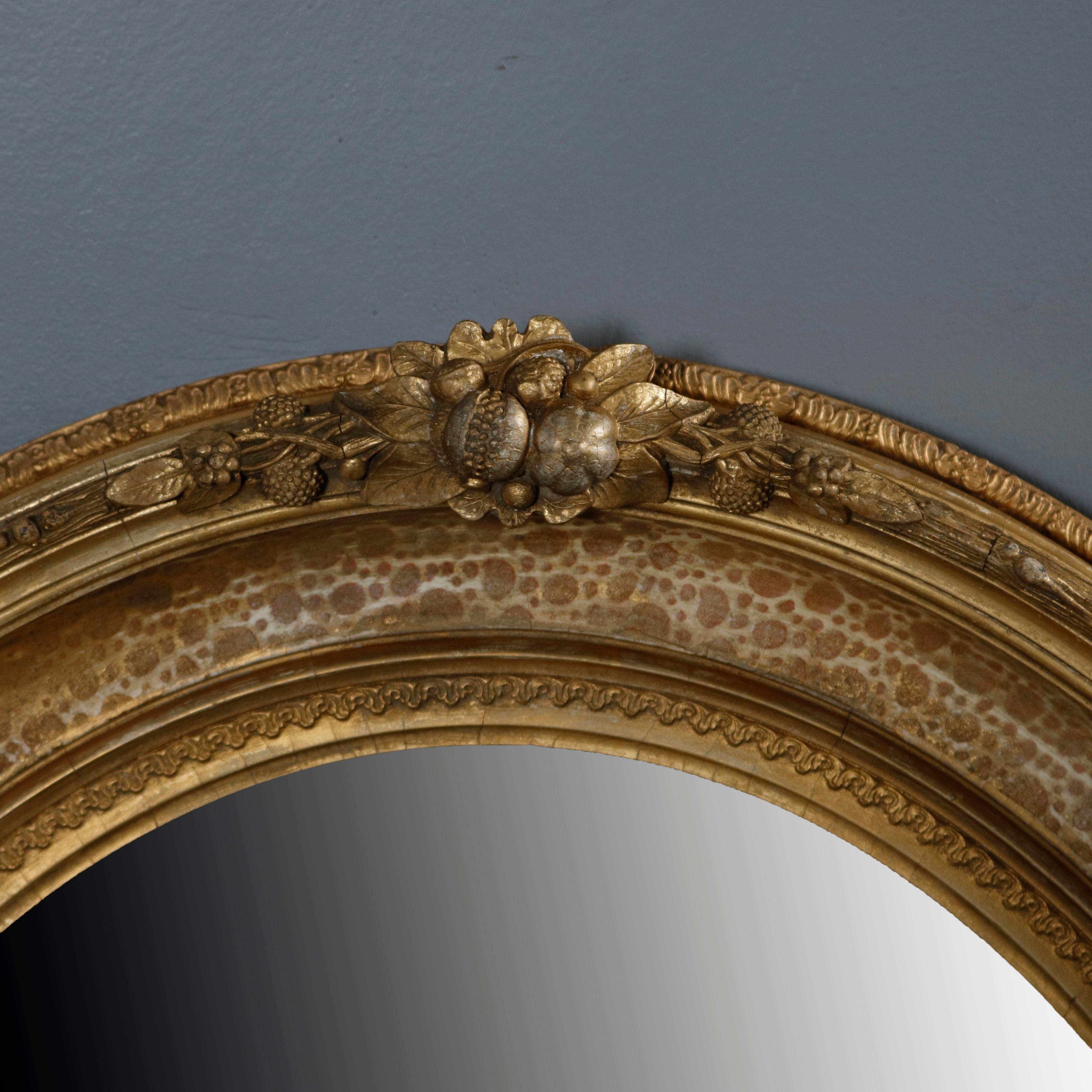 Pair of Large and Antique French Louis XIV Floral Giltwood Oval Wall Mirrors 5