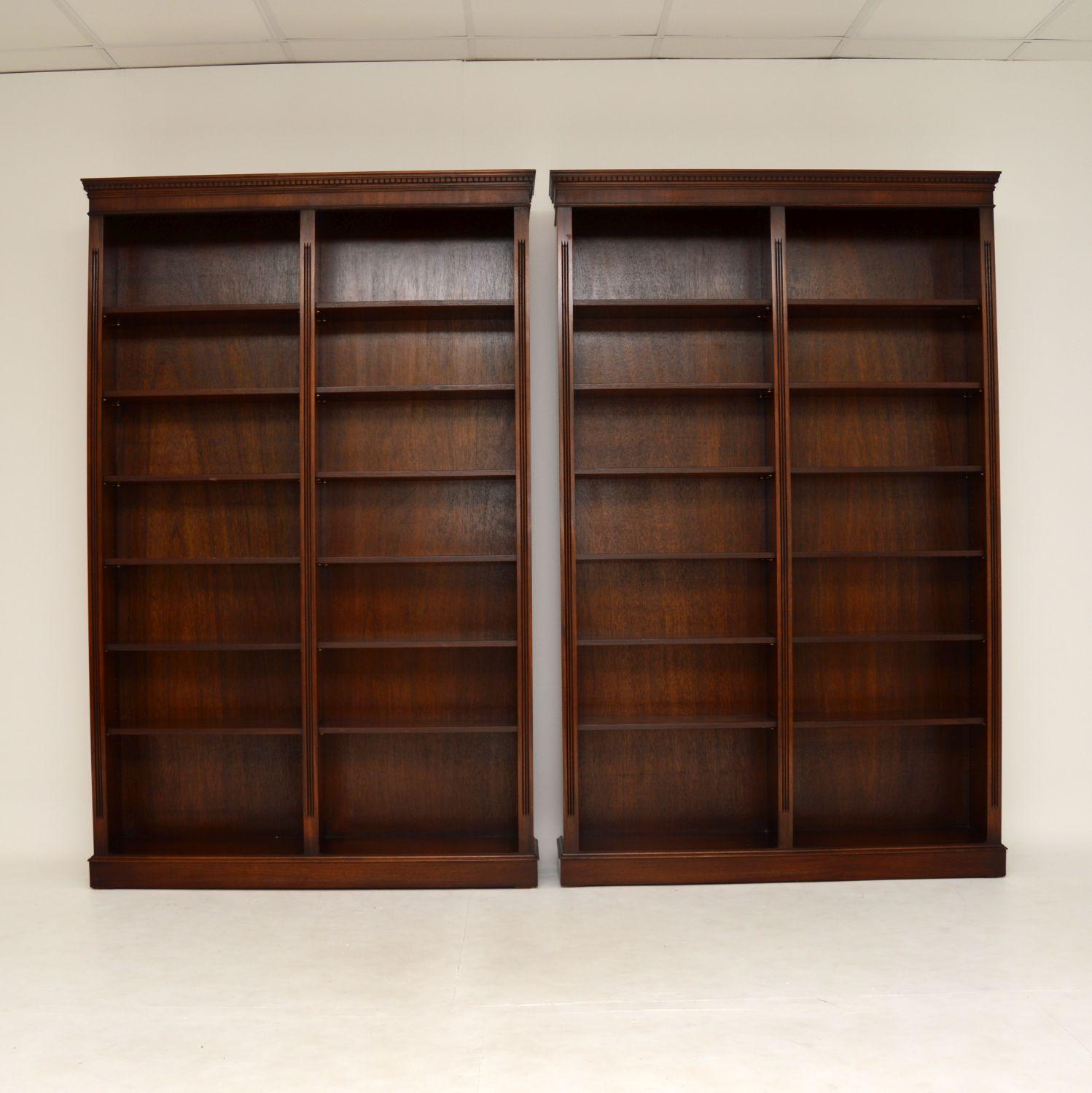 A smart and useful pair of large open bookcases in mahogany. These are in the antique Georgian style, they date from around the 1960’s period.

They are of fine quality, are very well constructed and are in excellent condition, with only some