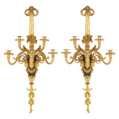 Pareja de apliques grandes de bronce dorado antiguo según François Rémond