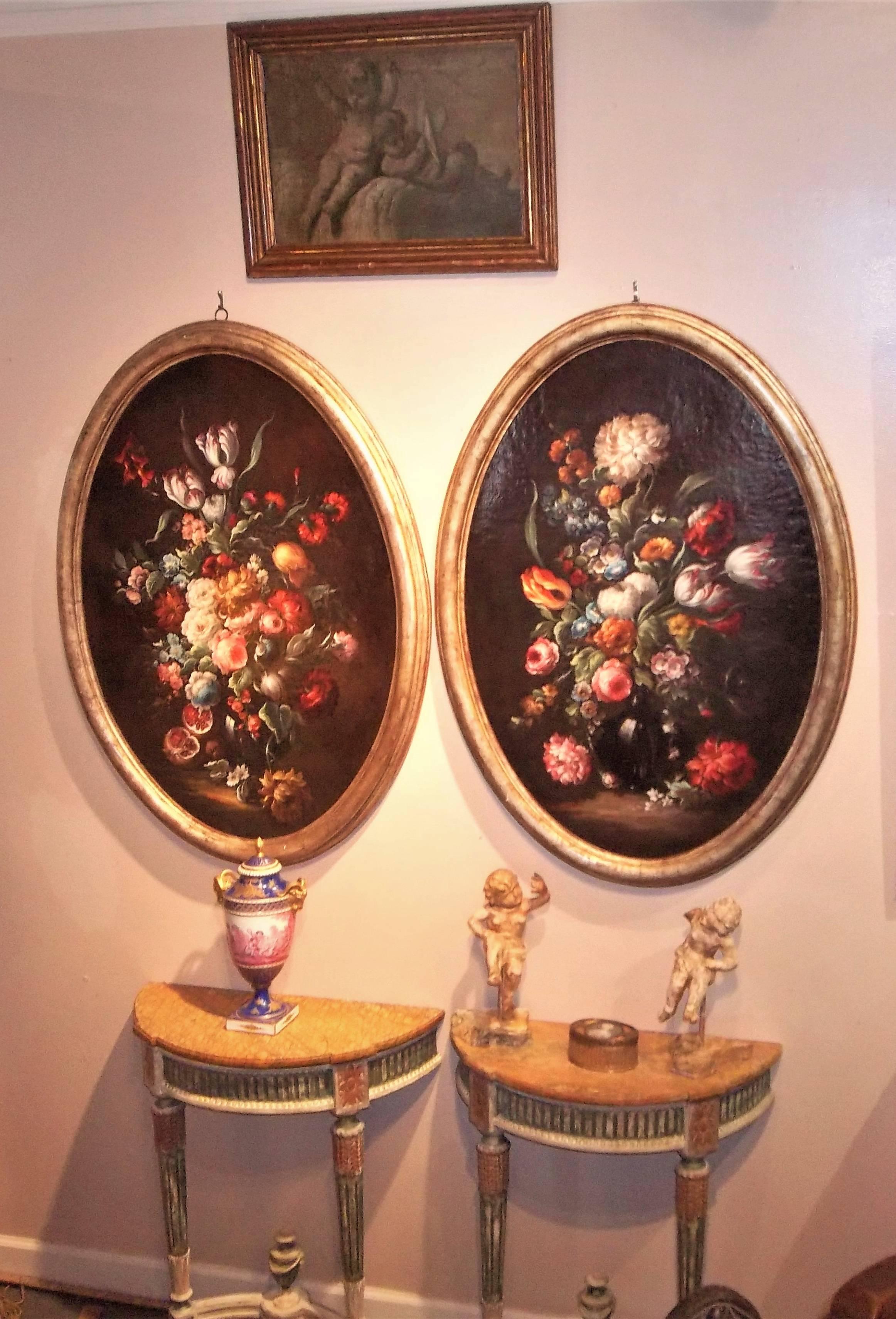 Manner of Simon Pietersz. Verelst (Dutch Golden Age, 1644-1710)
Including frame 44 inches by 32 inches.  Sight of canvas only 38.25 tall 26.5 wide
Roses, carnations, morning glories and other flowers in a glass vase with pomegranates; and tulips,