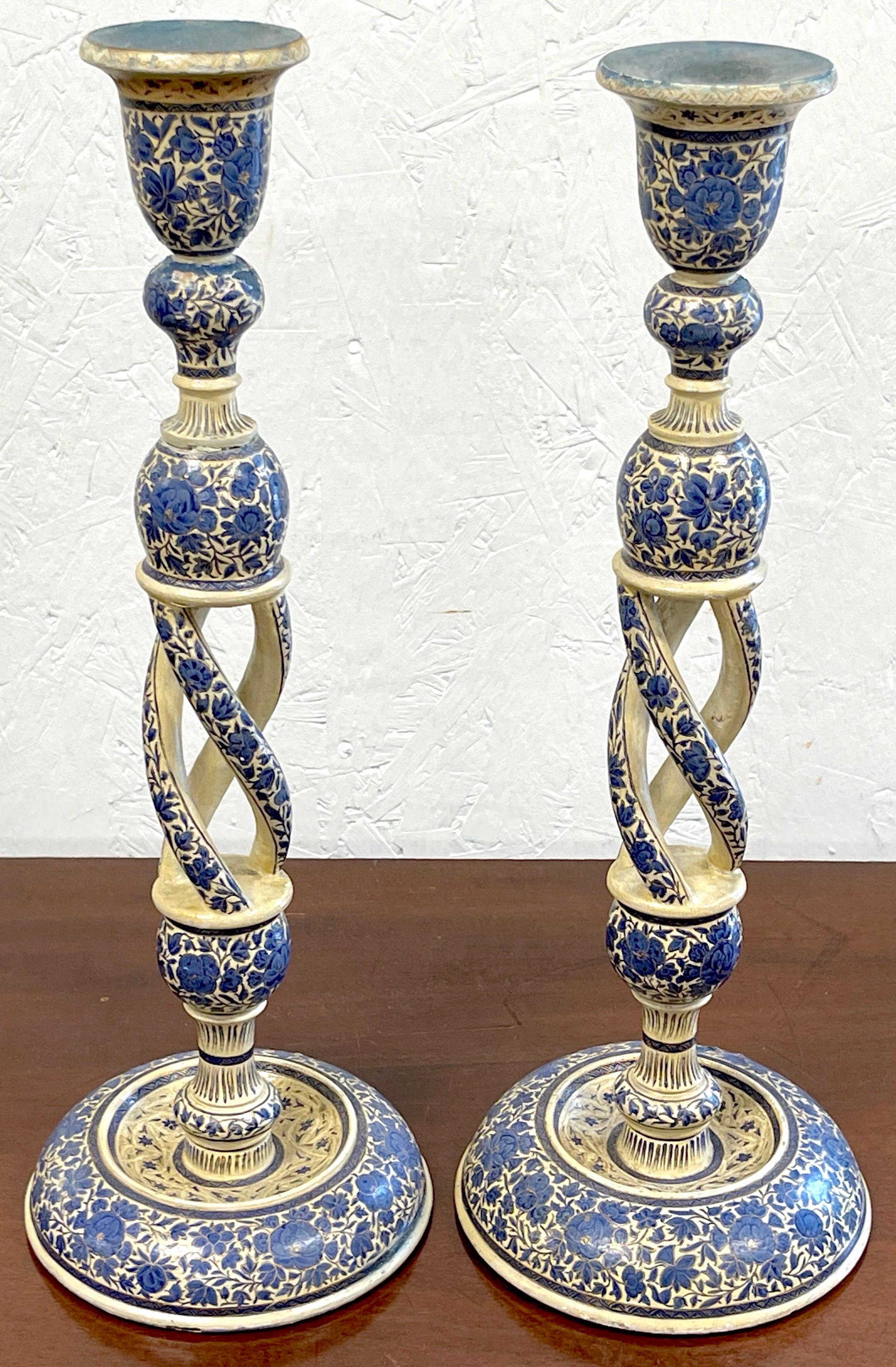 Pair of Large Antique Kashmiri Blue & White Candlesticks
India, Circa 1890s
Pair of exotic carved wood and lacquer candlesticks with spiral columns decorated in traditional Kashmiri off white and blue floral motif.