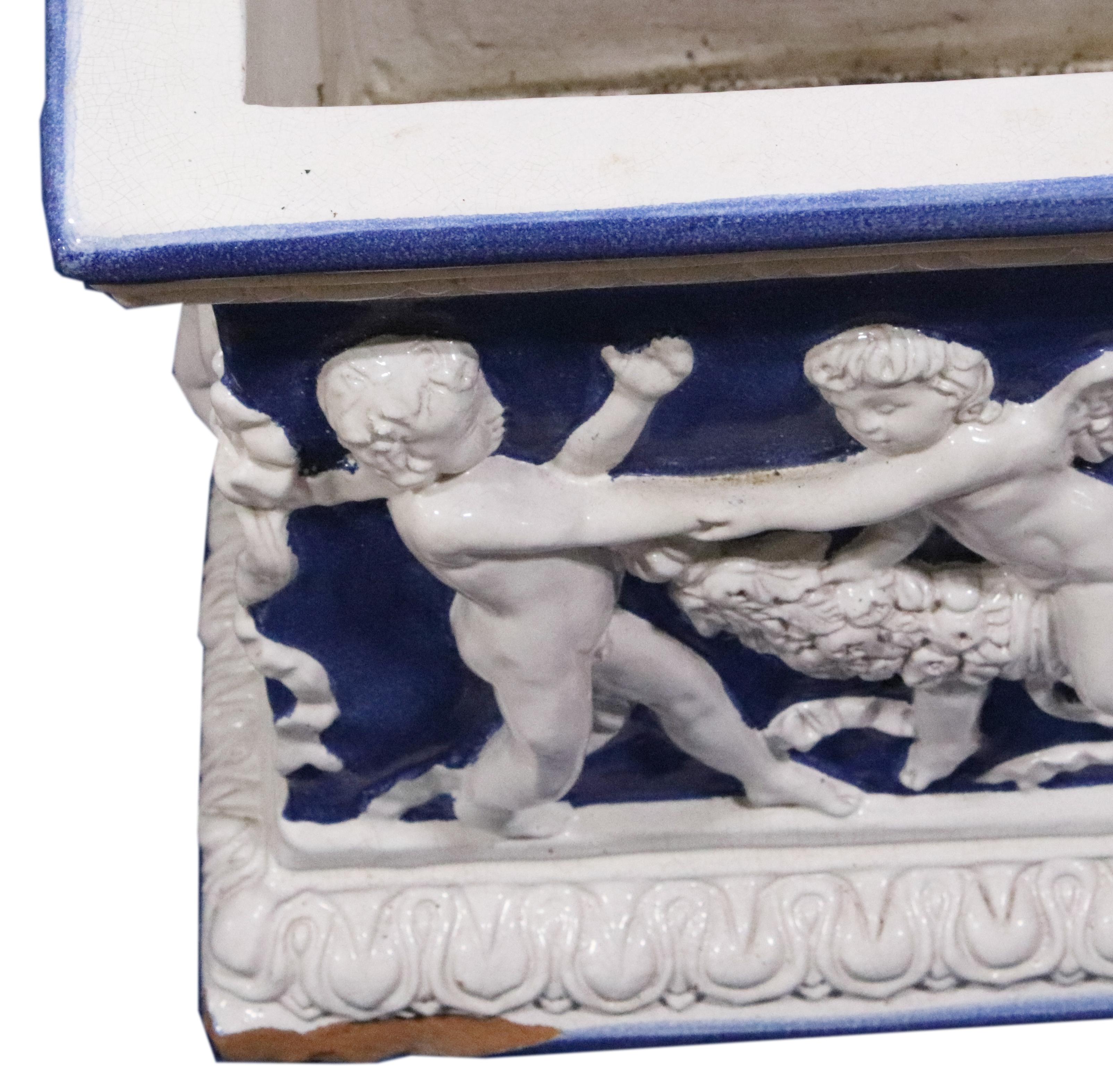 Pair of Large Antique Majolica Blue and White Planter Boxes with Putti For Sale 3