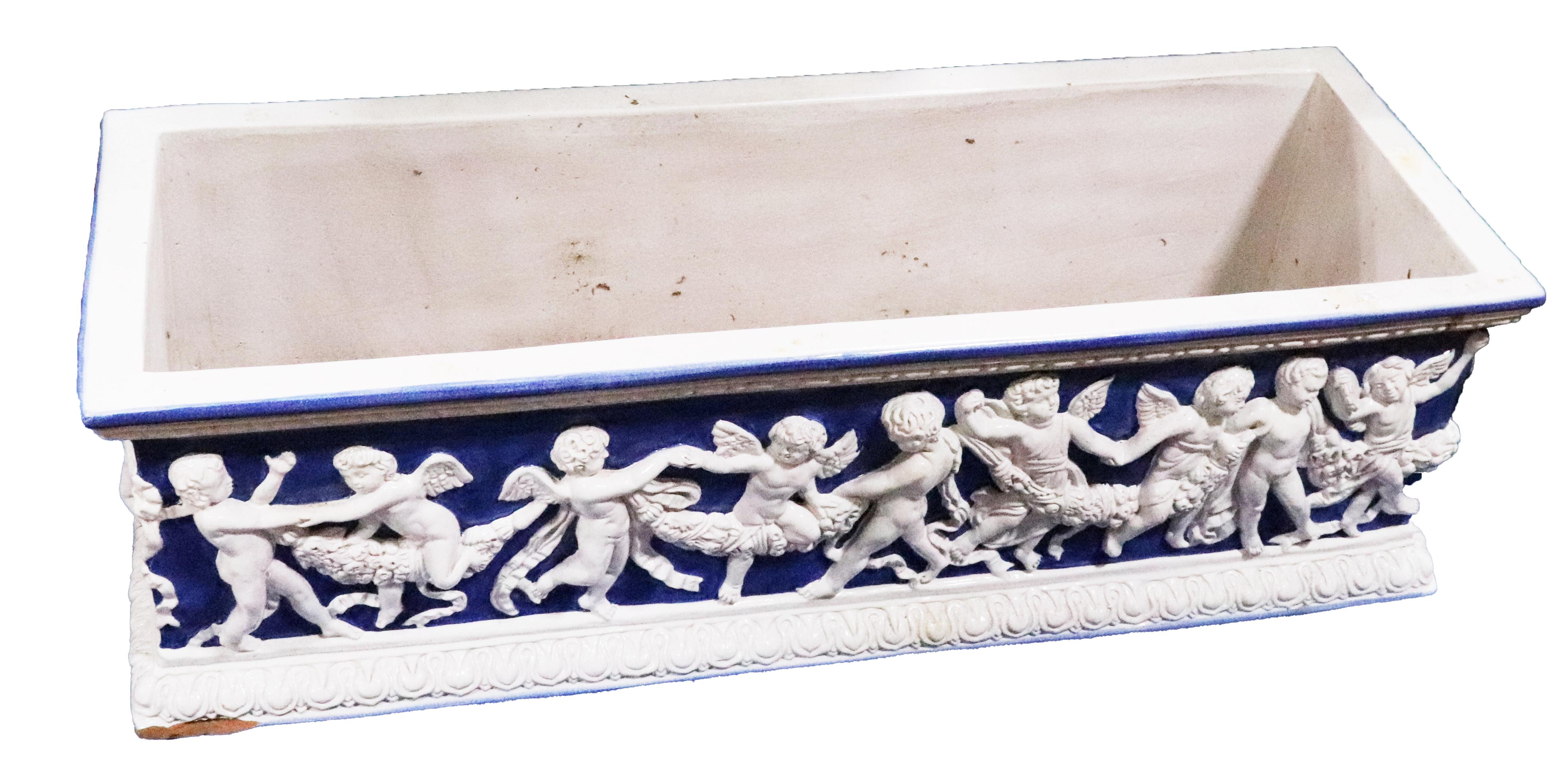 Pair of Large Antique Majolica Blue and White Planter Boxes with Putti For Sale 4