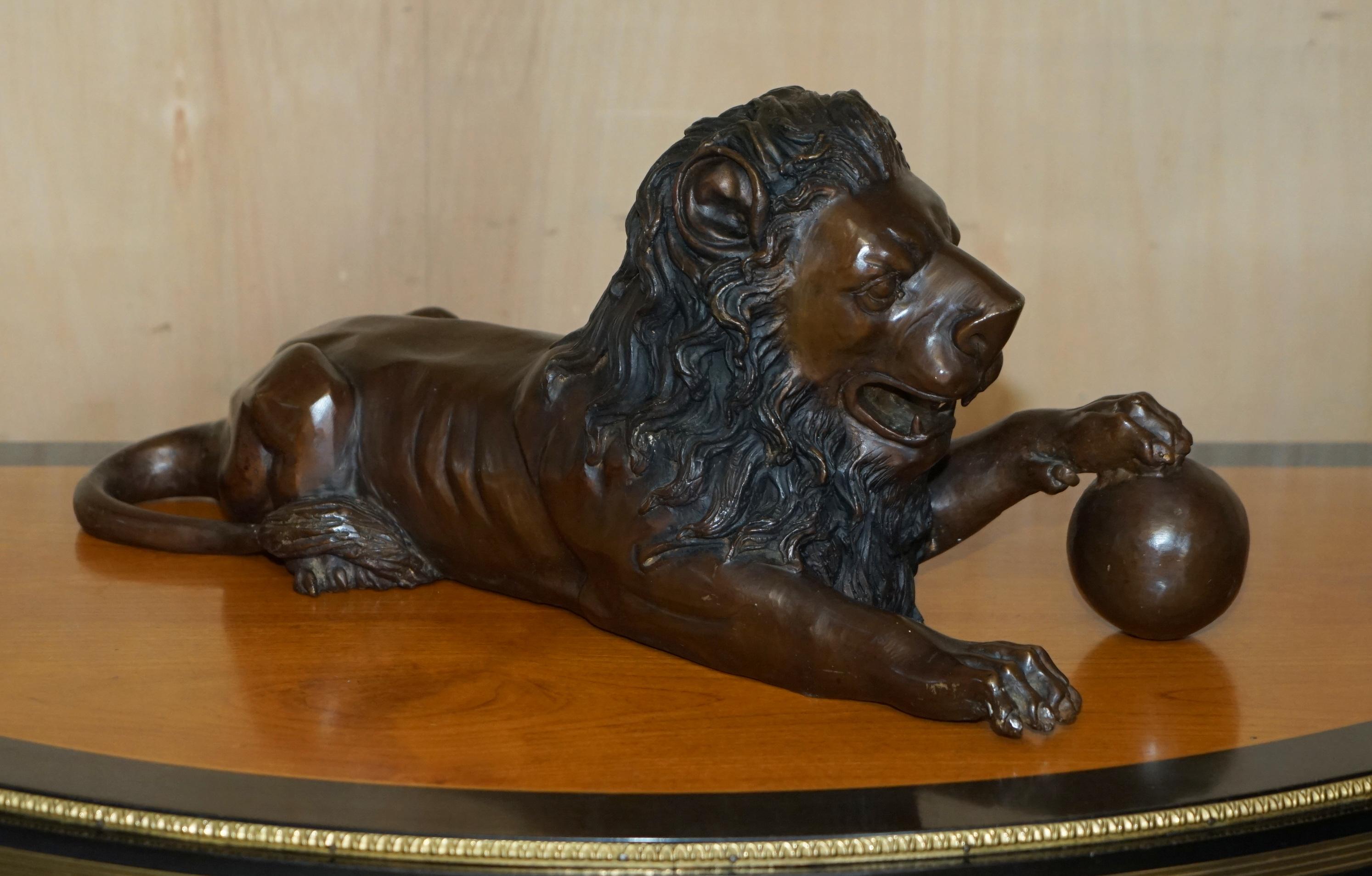Royal House Antiques

Royal House Antiques is delighted to offer for sale this stunning pair of early 20th century bronze statues of Recumbent Lions resting with balls under their paws 

These are lovely large statues, they work perfectly on a