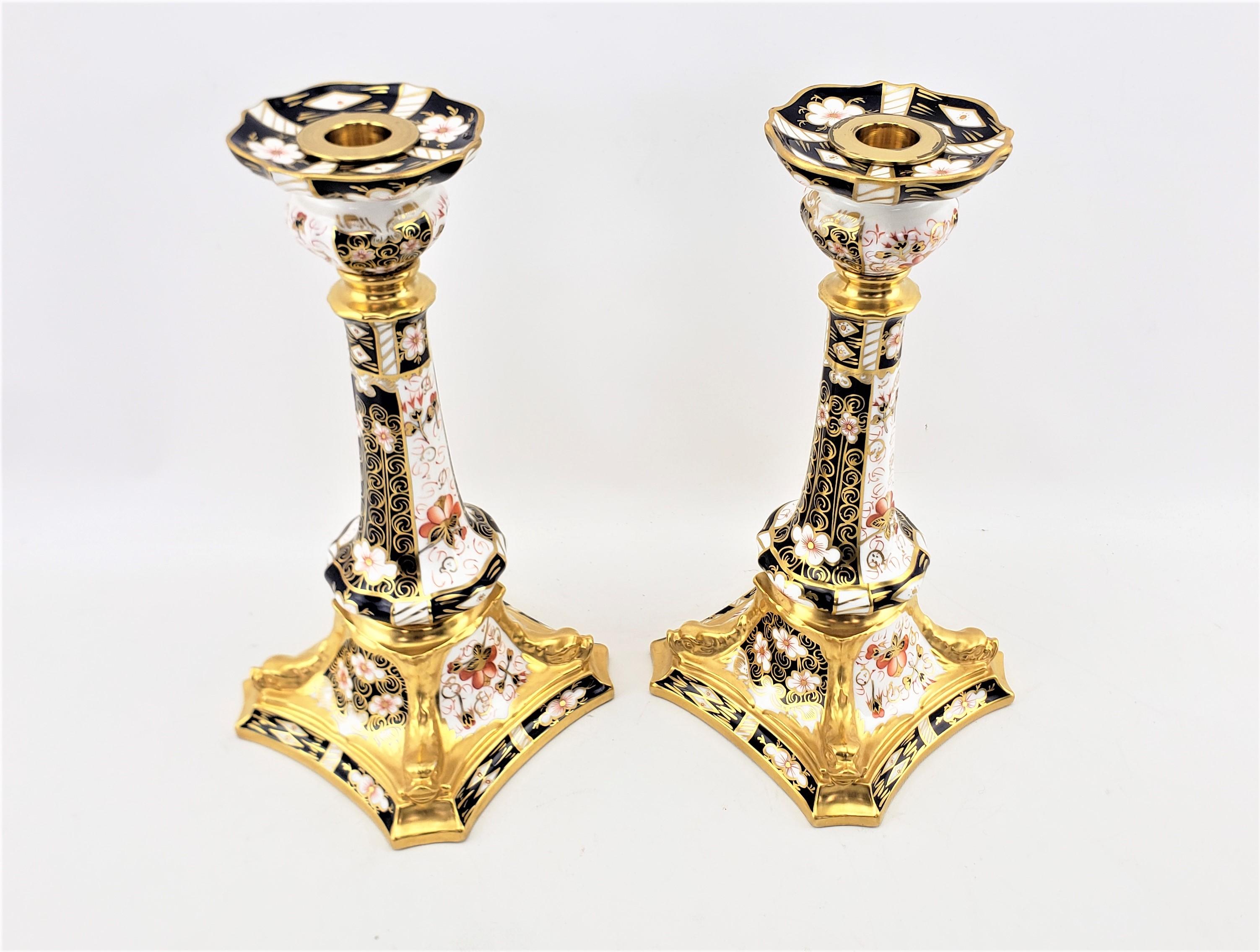 English Pair of Large Antique Royal Crown Derby 2451 Imari Dolphin Candlesticks For Sale