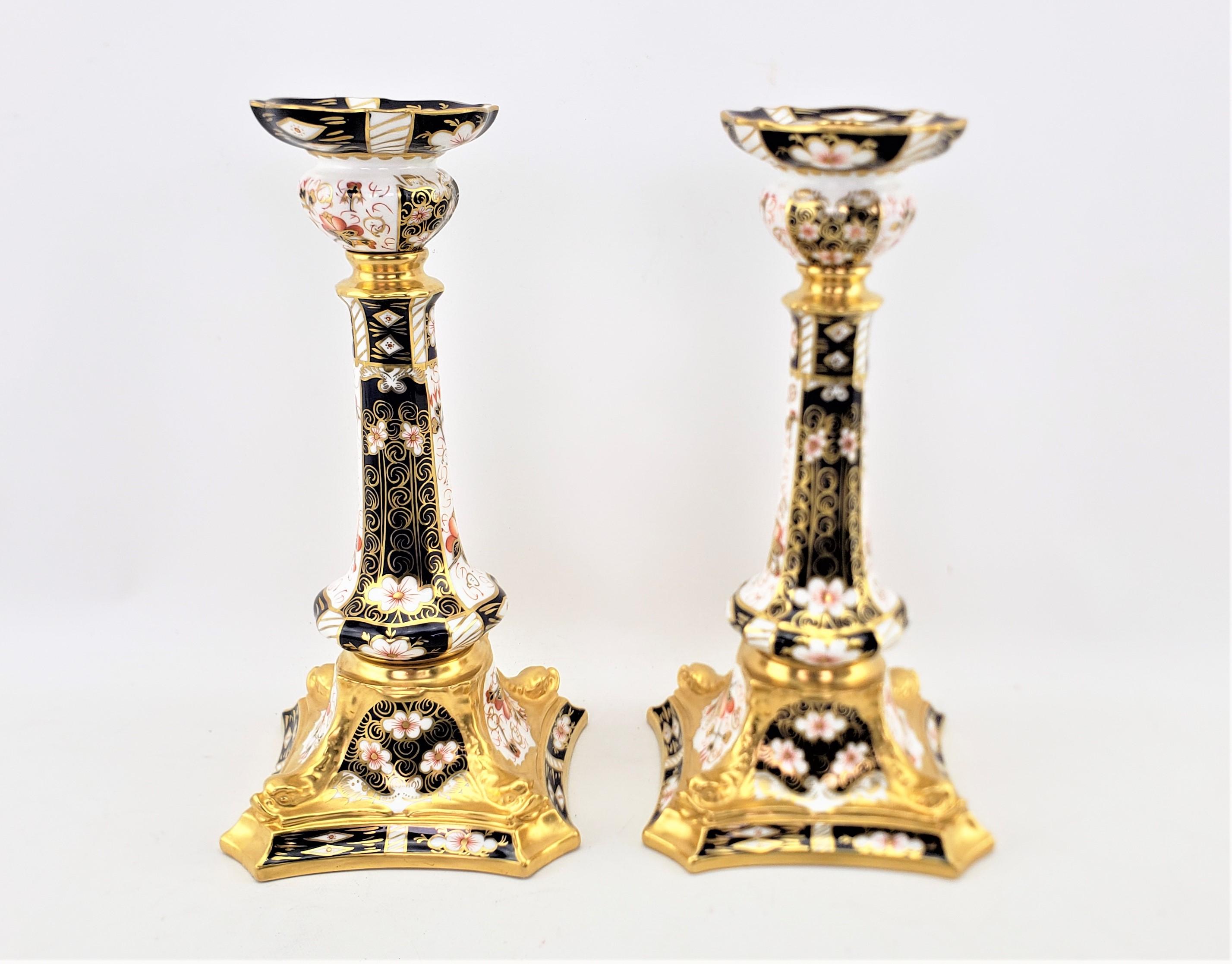 Pair of Large Antique Royal Crown Derby 2451 Imari Dolphin Candlesticks In Good Condition For Sale In Hamilton, Ontario