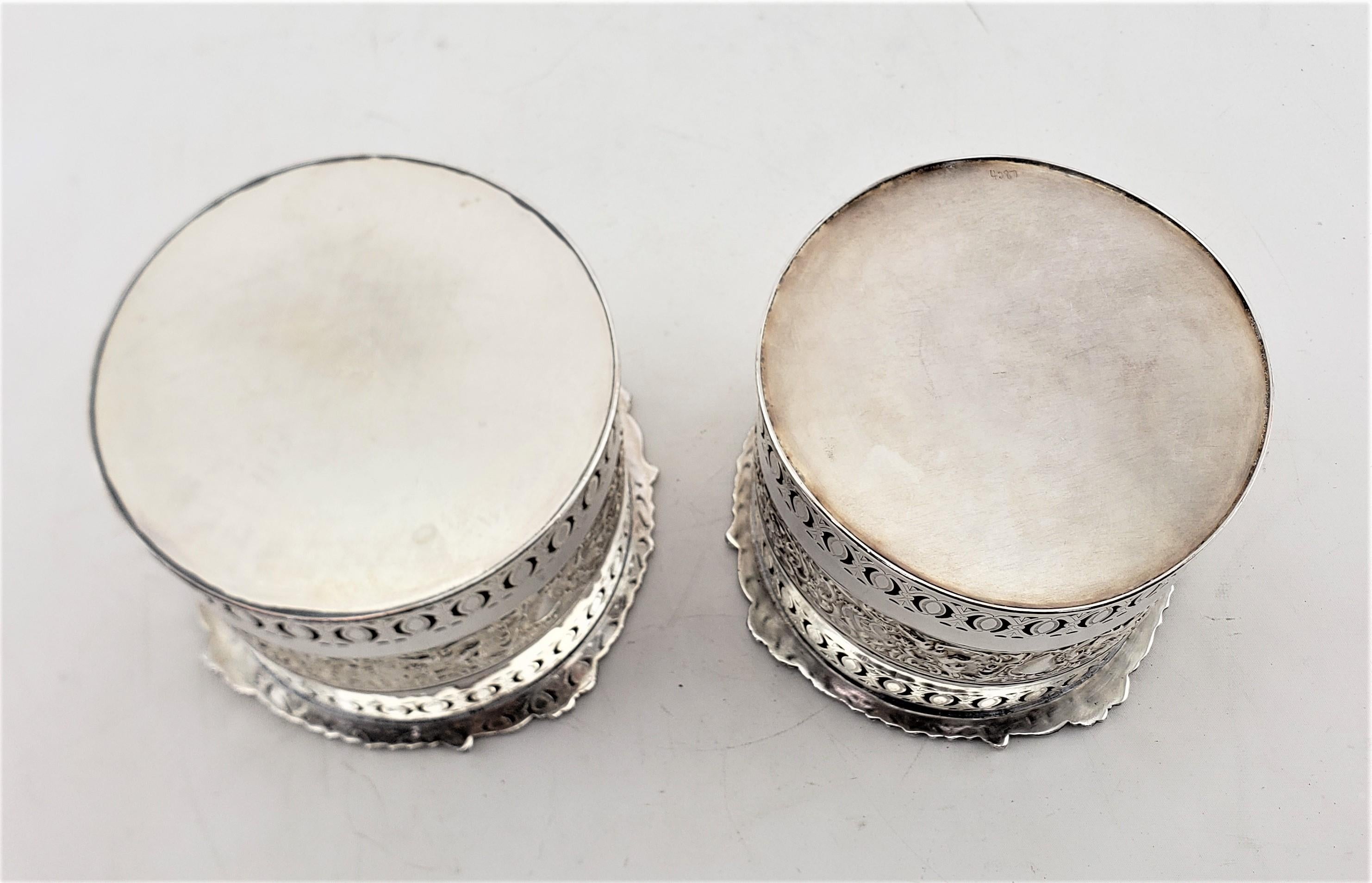 Pair of Large Antique Silver Plated Bottle Coasters with Repousse Decoration For Sale 3