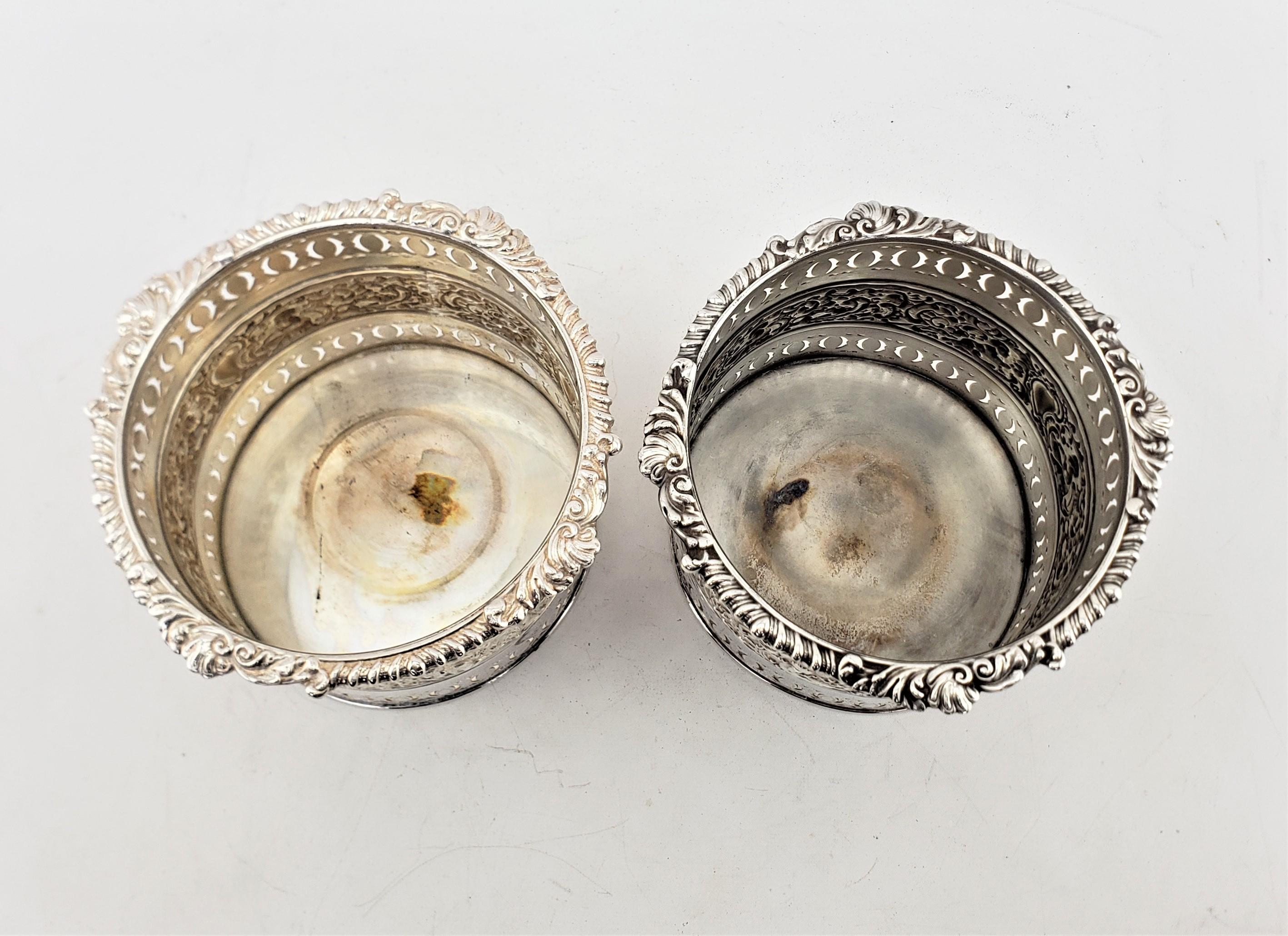 Pair of Large Antique Silver Plated Bottle Coasters with Repousse Decoration For Sale 1