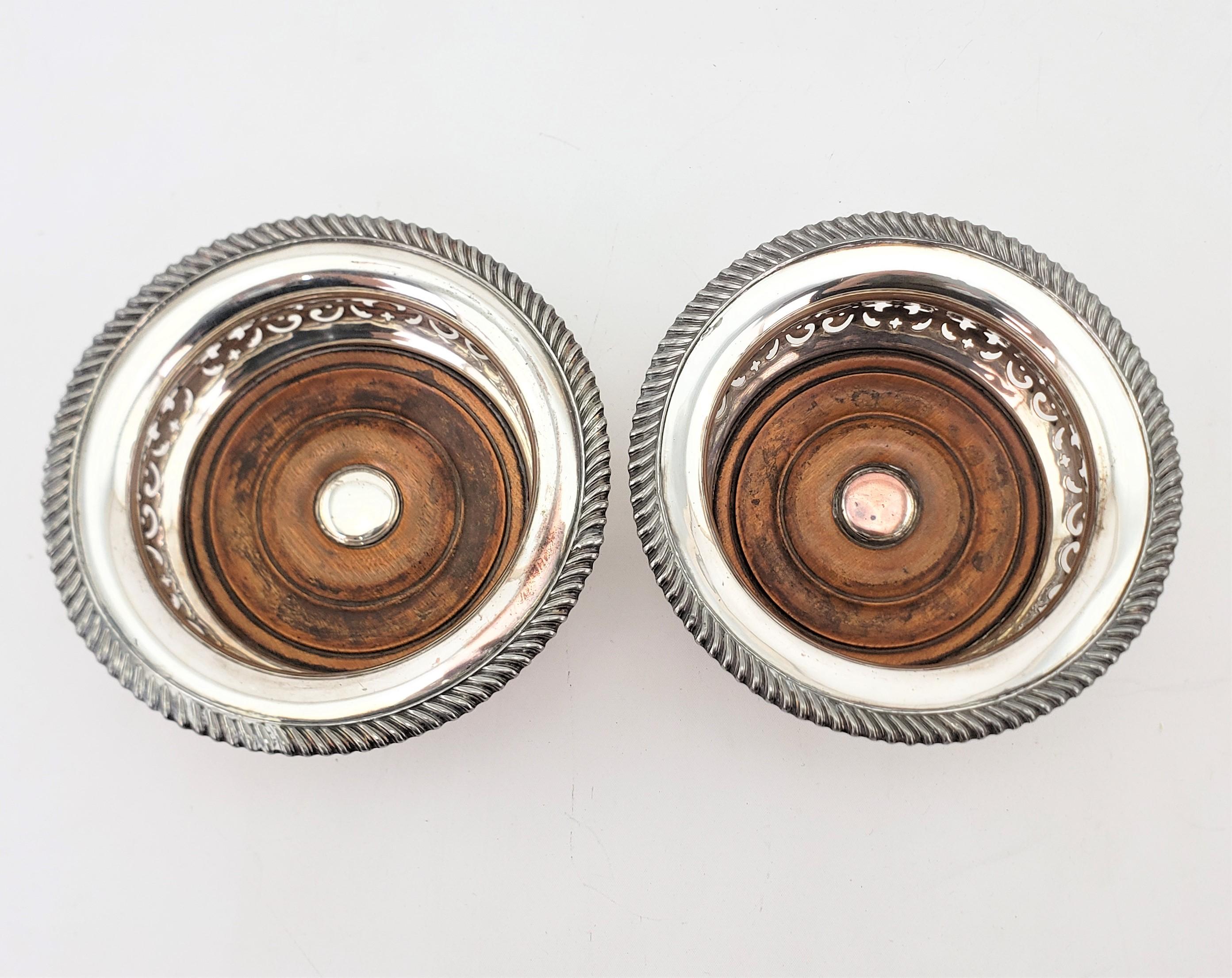 Machine-Made Pair of Large Antique Silver Plated Wine Bottle Coasters with Wooden Inserts