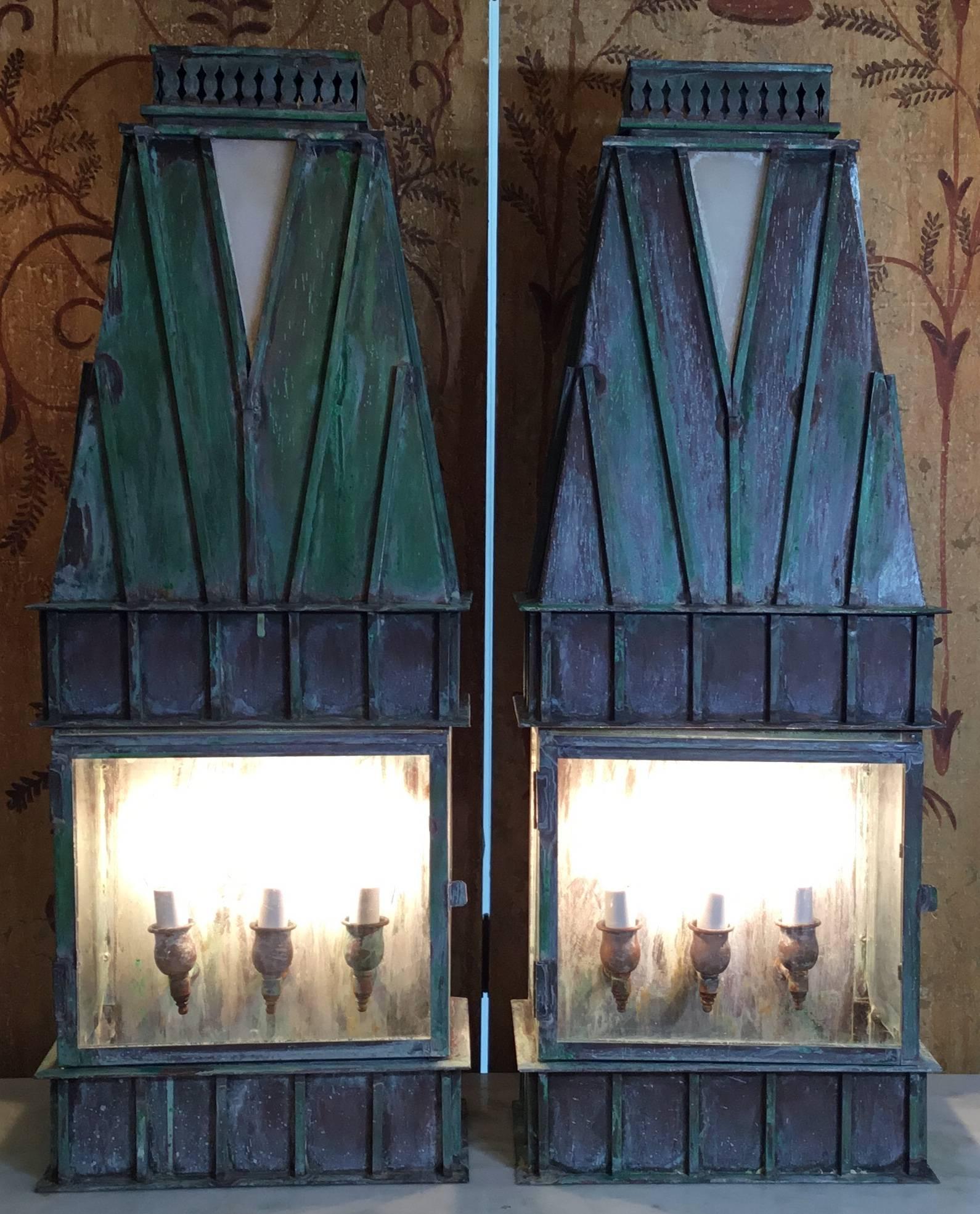 Impressive pair of vintage lanterns made of hand crafted solid brass ,with three 60/watt light each lantern, electrified and ready to use.
Suitable for wet locations.