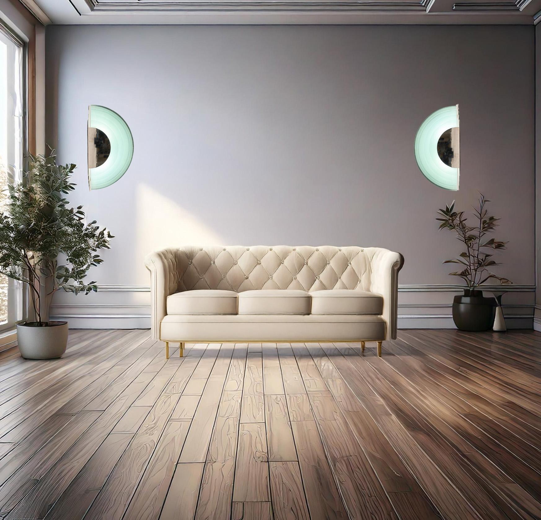 These large Argentinian Art Deco sconces boast a striking semi-circular design, meticulously crafted from chrome and tempered, sand-blasted glass. The glass is elegantly arranged in five graduated descending layers, allowing light to diffuse through