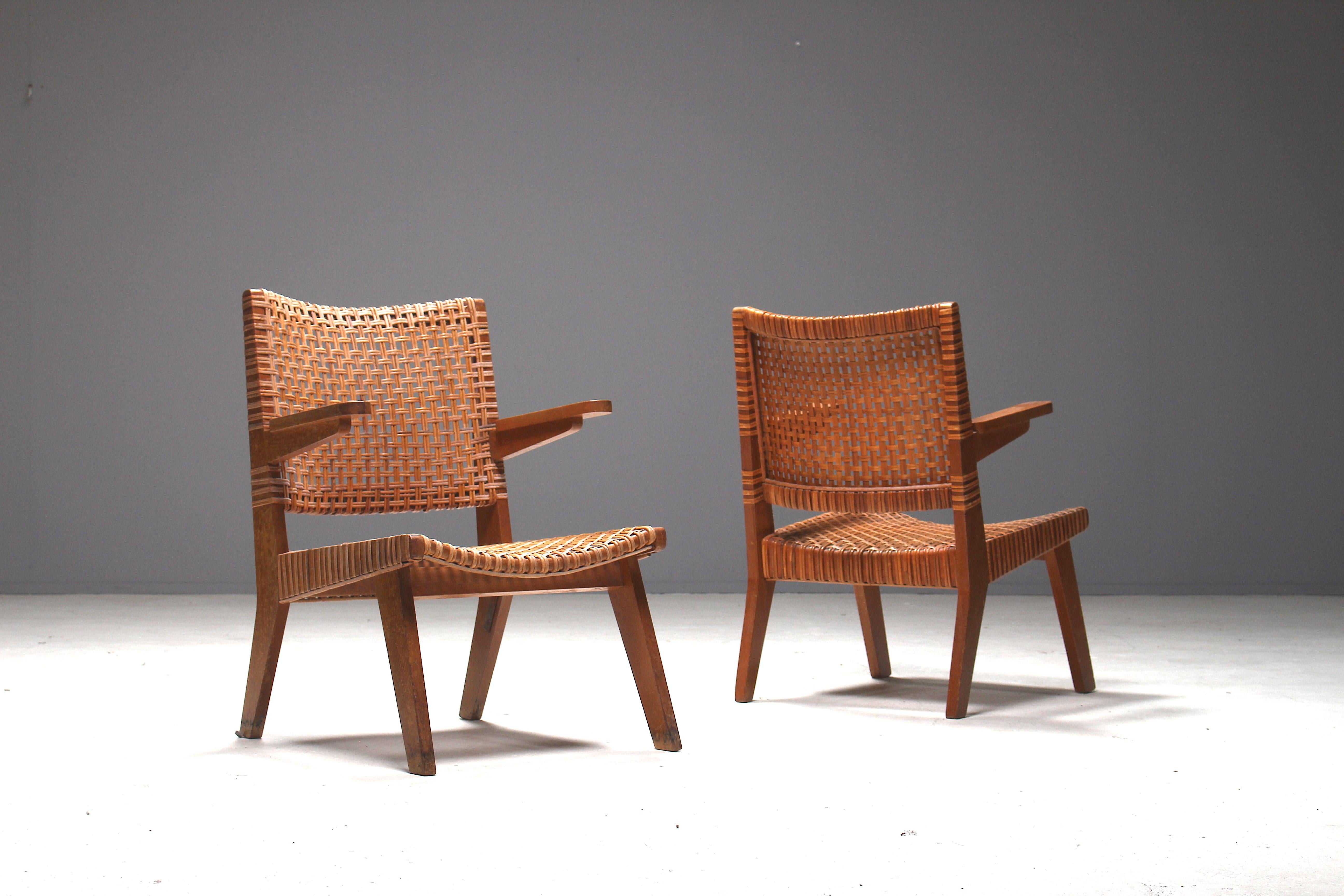 A very rare pair of armchairs by Pierre Jeanneret from the mid-1950s Swiss period. These chairs are part of a low scale production serie. This pair of chairs is very rare, more common are the chairs Jeanneret specially made for the apartment of