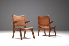 Pair of Large Armchairs by Pierre Jeanneret Geneva, Switzerland, 1950s