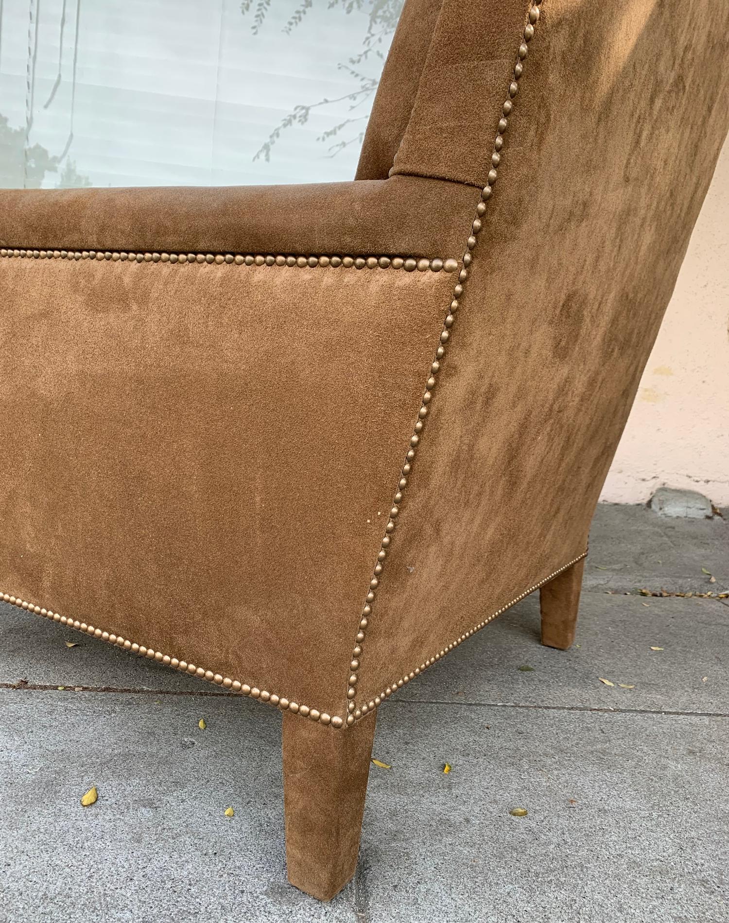 Pair of large armchairs upholstered in brown suede with nailhead trimming.
The chairs are in excellent condition, vintage but newly upholstered.
Measurements:
37” high x 32” wide x 39” deep x 20” seat height x 25” seat depth x 25” seat width x