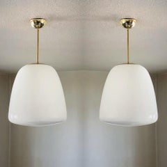 Pair of Large Art Deco Bauhaus Opaline Glass Brass Theatre Pendants, 1930s