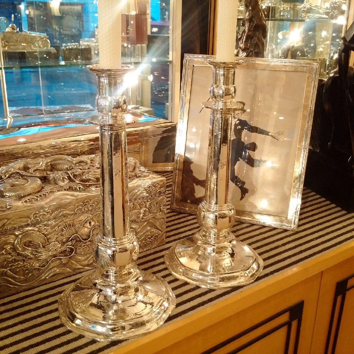 large silver candlesticks
