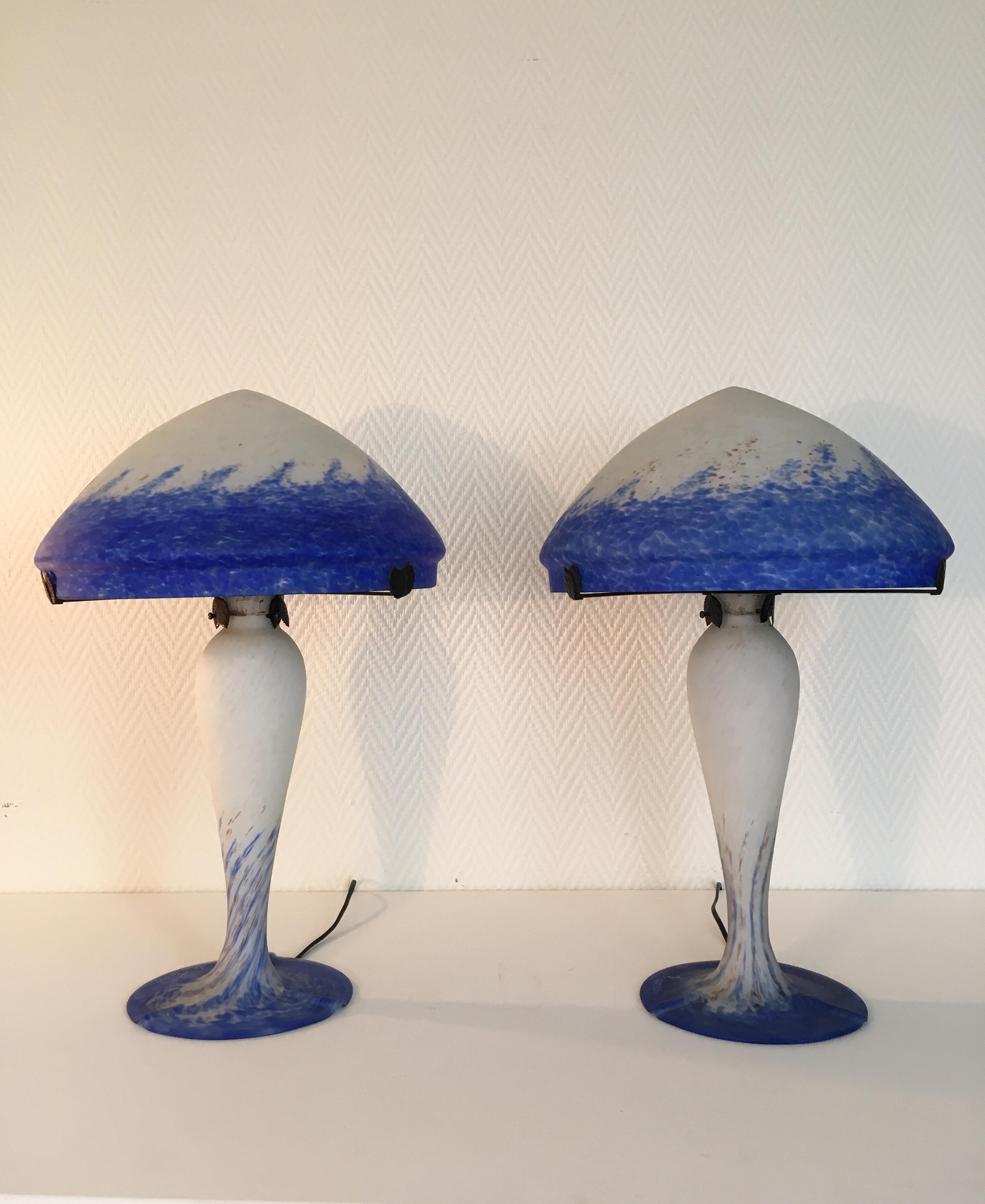 Stunning table lamps by Art de France. They were manufactured in France and feature blue, white and even some red colors. They remain in very good condition. Pieces will be carefully packed and send insured. 