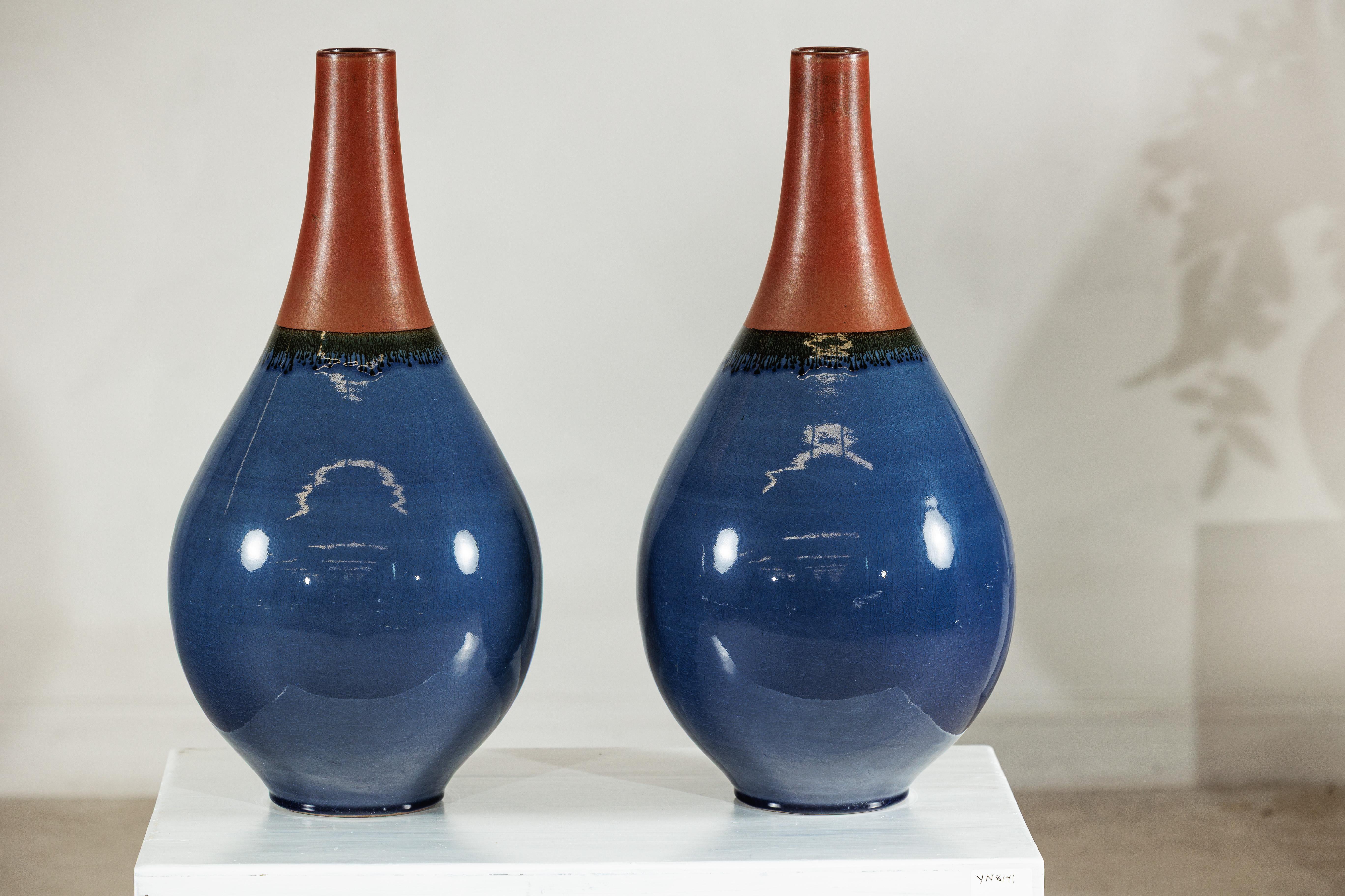 20ième siècle Pair of Large Artisan Teardrop Ceramic Vases in Deep Blue and Terracotta Glaze en vente