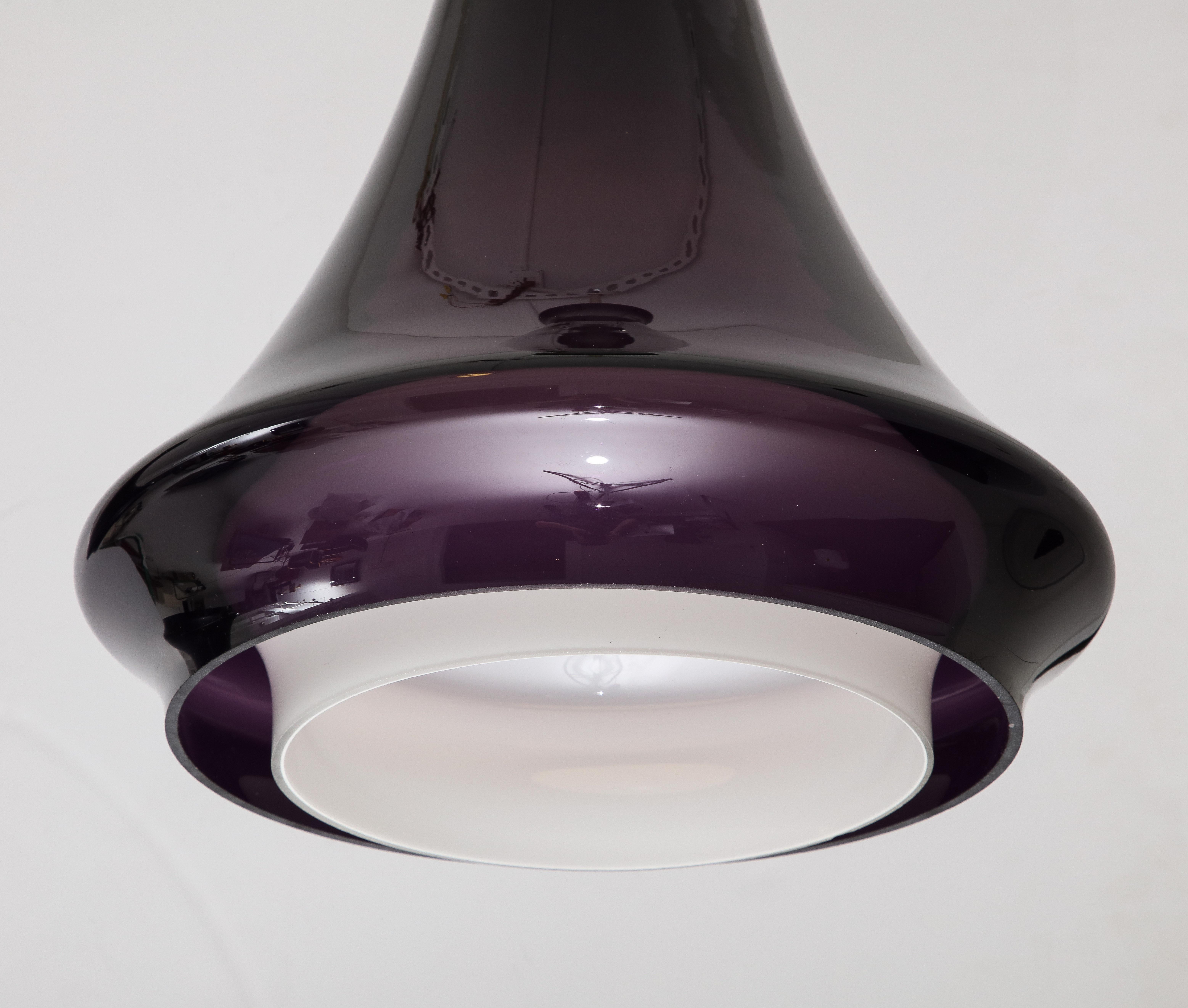 Brass Pair of Large Aubergine Glass Pendant lights. For Sale