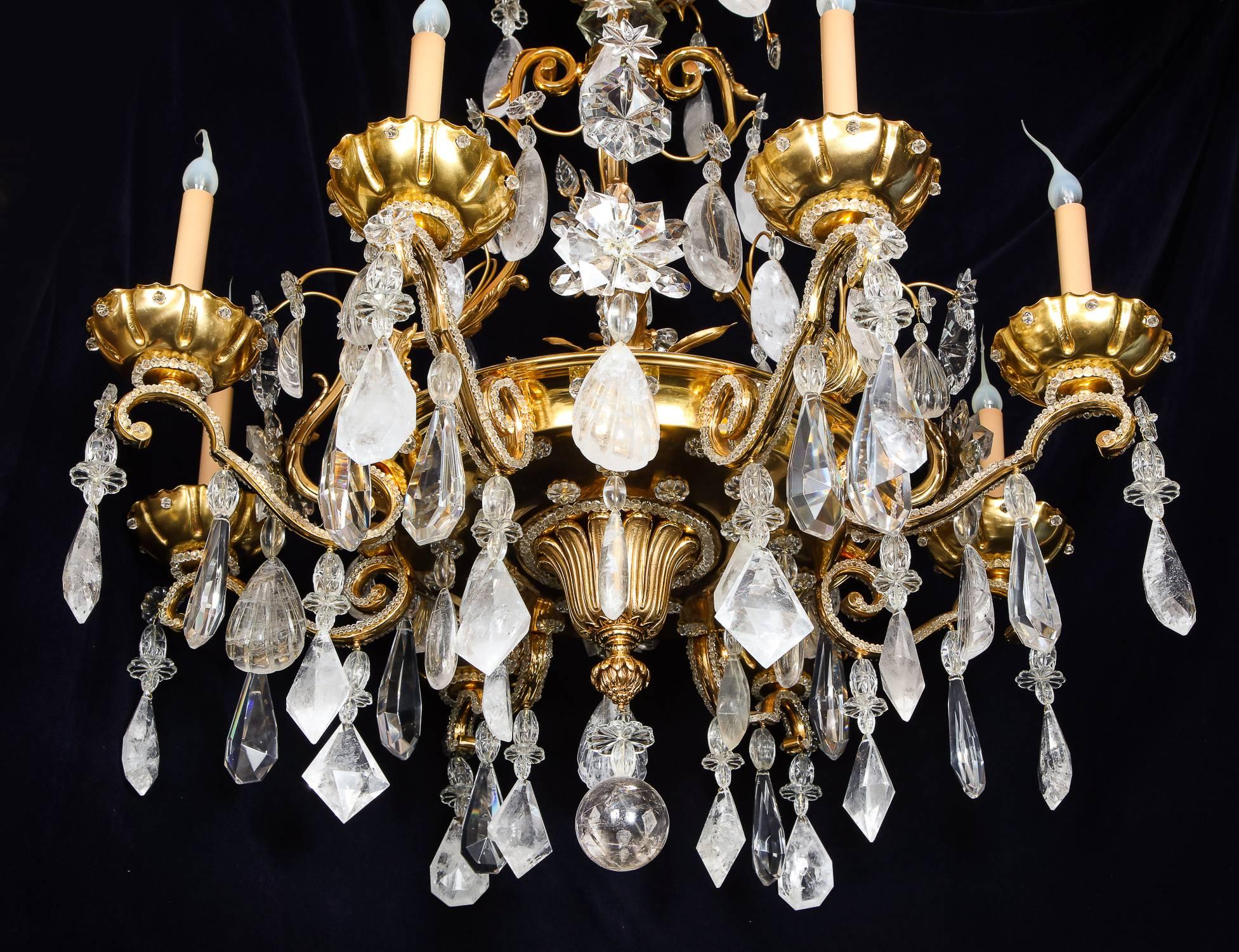 Hand-Carved Pair of Large Baguès French Louis XVI Style Bronze and Rock Crystal Chandeliers For Sale