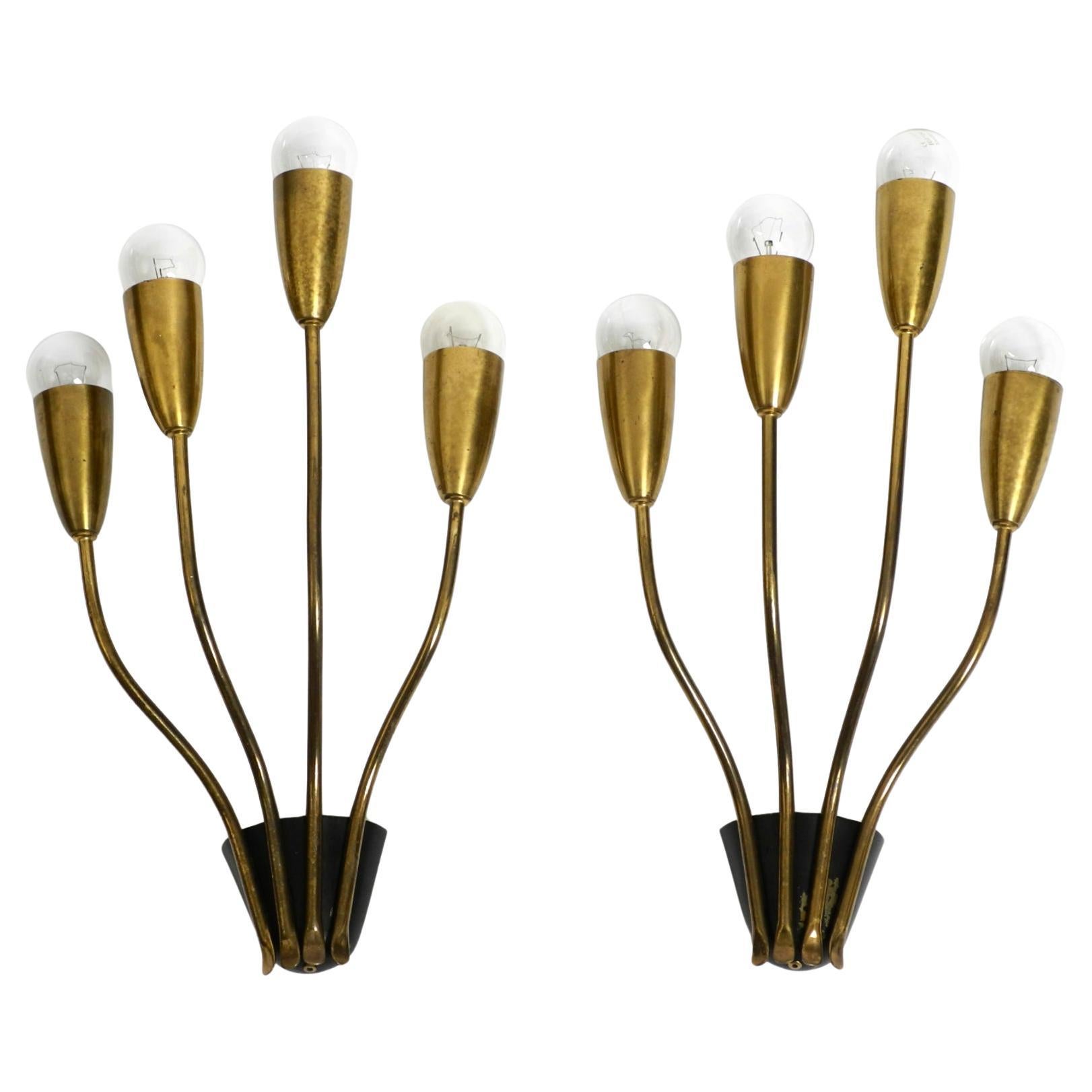Pair of large beautiful four-armed original Mid Century Modern brass wall lamps