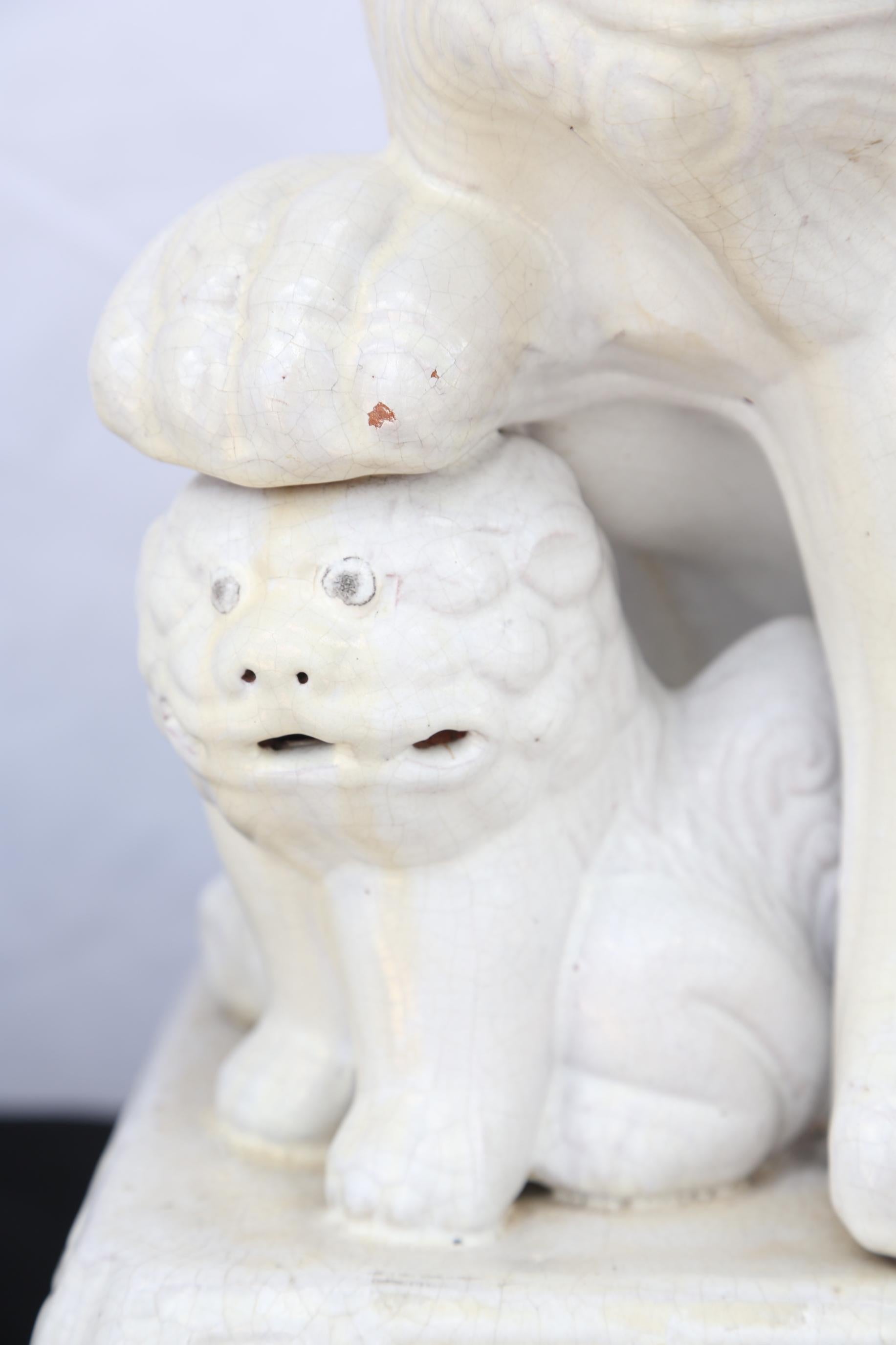 Chinese Pair of Large Blanc de Chine Foo Dogs
