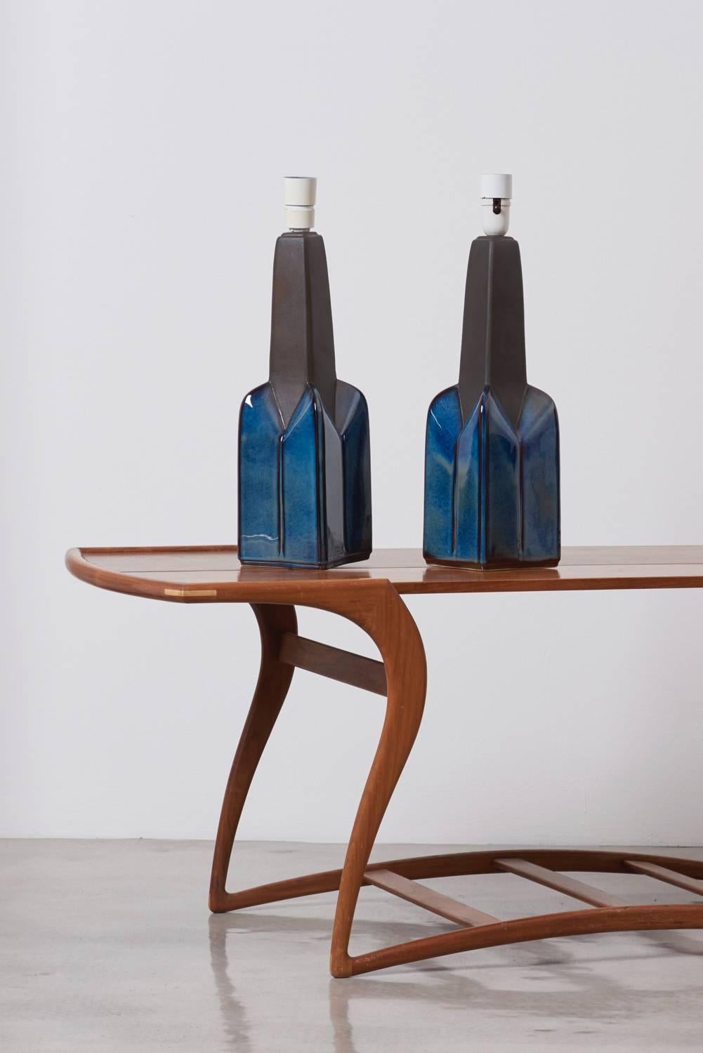 A pair of blue ceramic table lamps by Søholm Stentøj, Denmark. Marked by Søholm and in mint condition. One E27 each.
To be on the safe side, the lamp should be checked locally by a specialist concerning local requirements.

