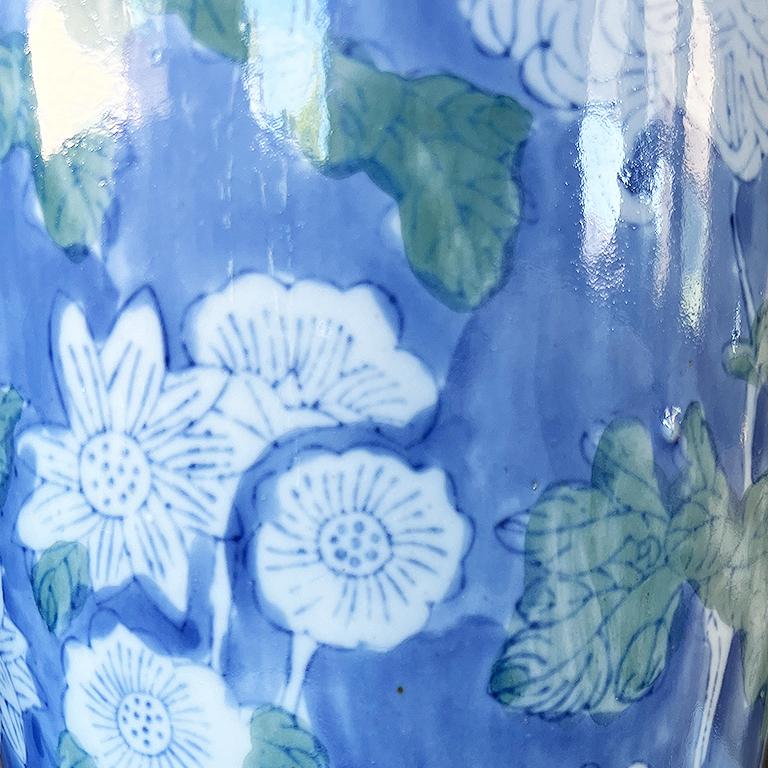 20th Century Pair of Large Blue Chinoiserie Vases with Hand-Painted White and Green Florals For Sale