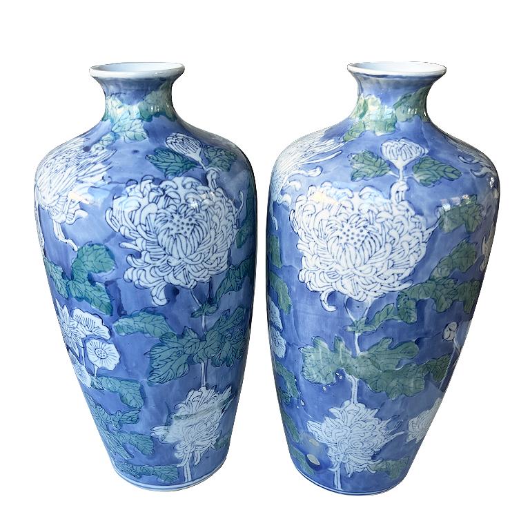 Ceramic Pair of Large Blue Chinoiserie Vases with Hand-Painted White and Green Florals For Sale
