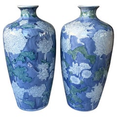 Pair of Large Blue Chinoiserie Vases with Hand-Painted White and Green Florals