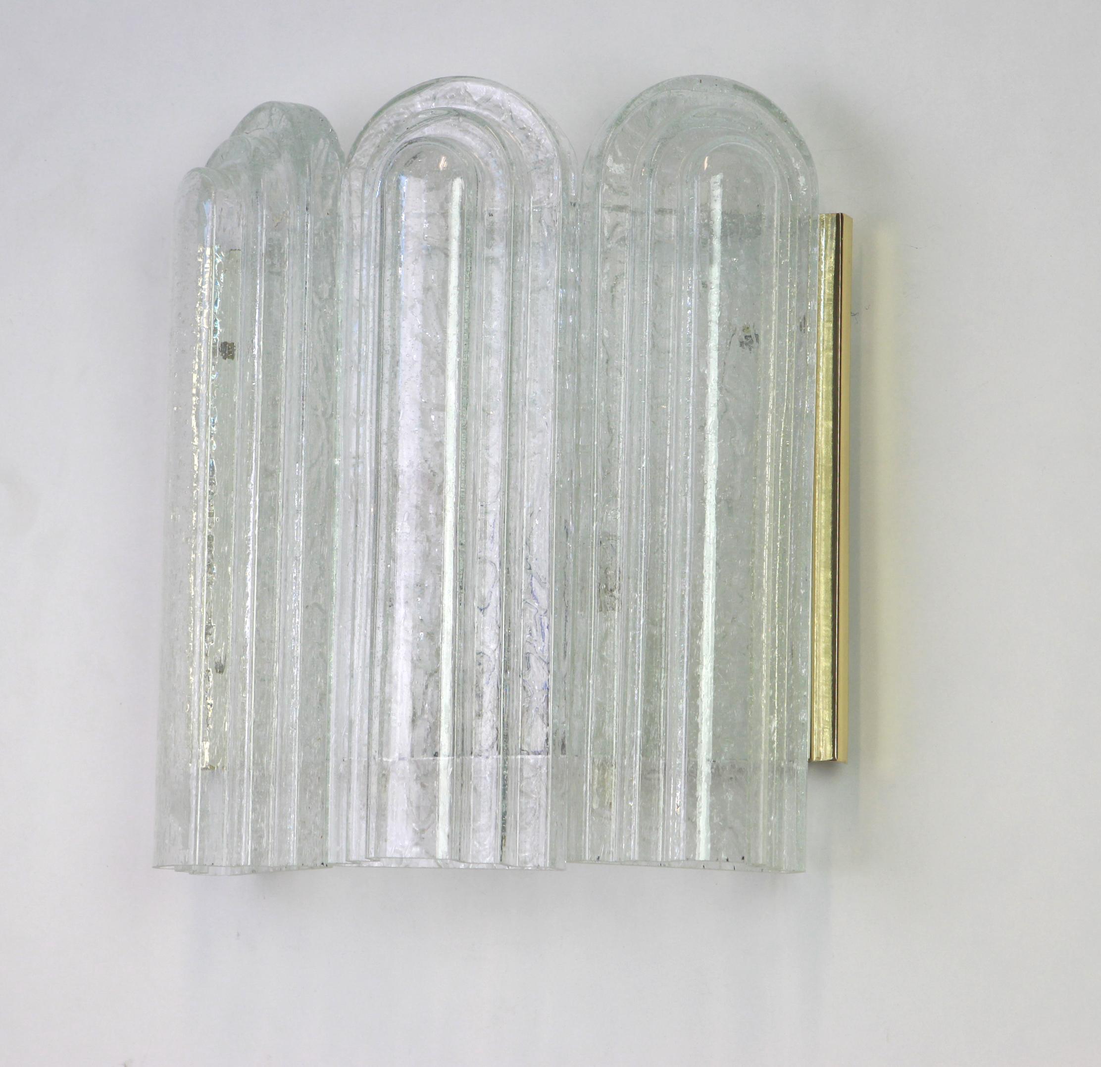 Wonderful pair of midcentury wall sconces with Murano glass elements, made by Doria Leuchten, Germany, manufactured, circa 1960-1969.
High quality and in very good condition. Cleaned, well-wired and ready to use.

Each sconce requires 2 x E27