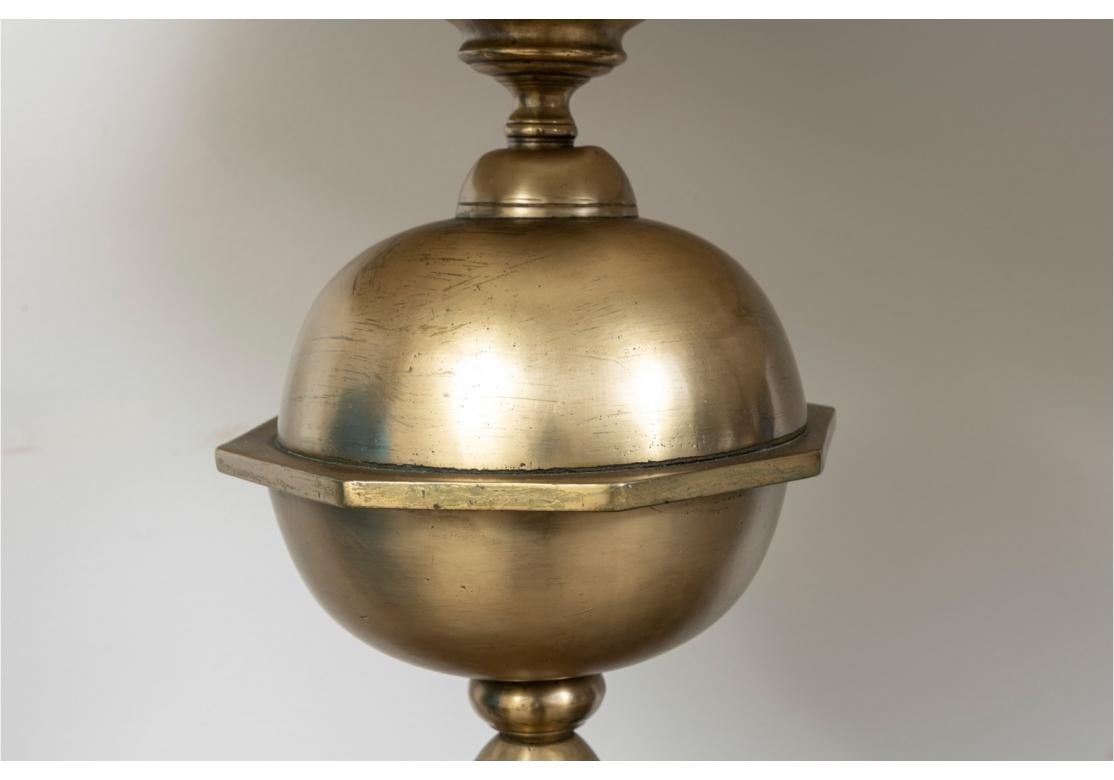 A interesting and decorative Pair of large brass andirons (Likely Antique)  are now mounted as table lamps and are definitive focal points. 
Dimensions: 46