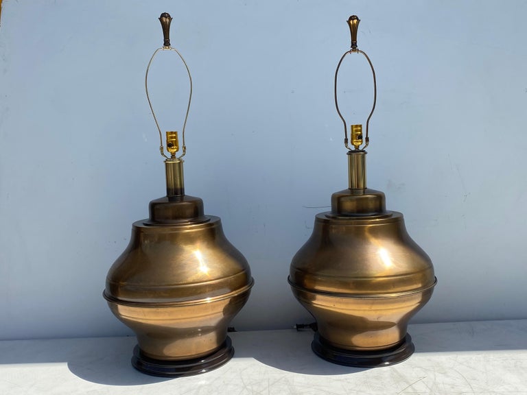 Pair of large ginger jar lamps in antiqued brass finish. 17
