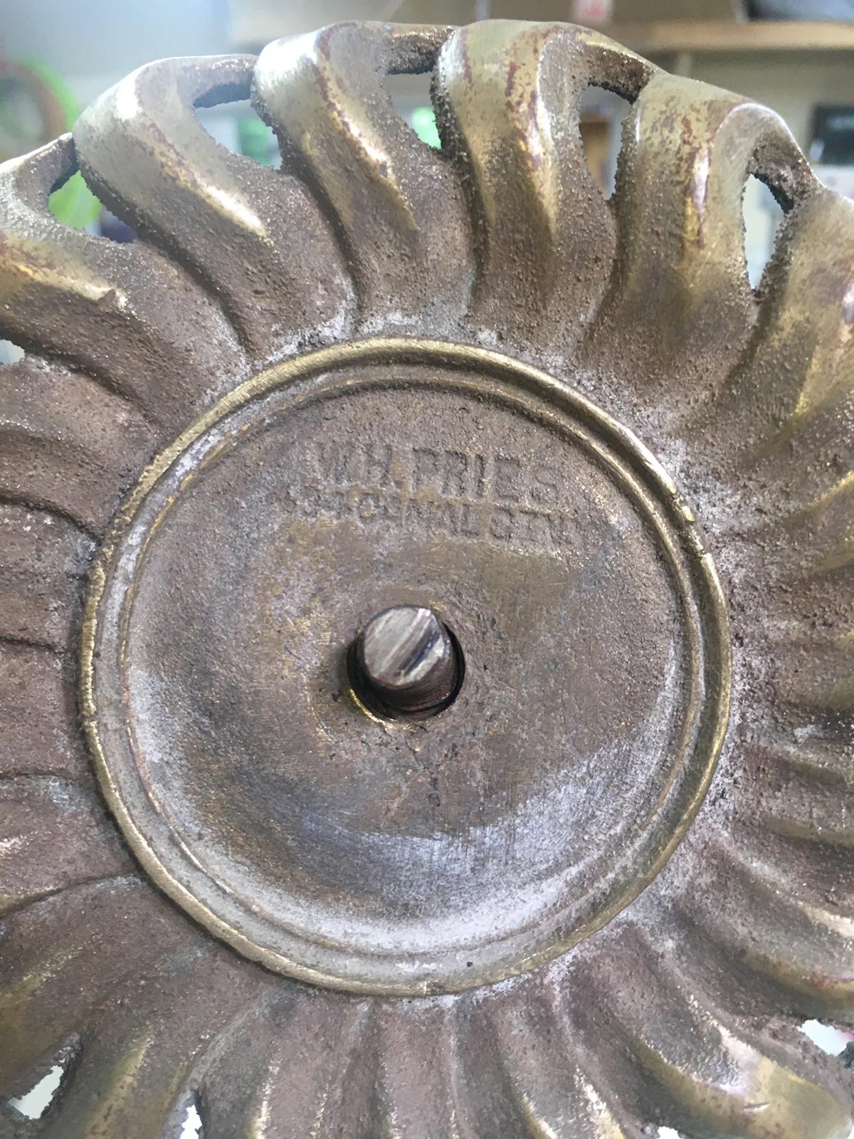Pair of large brass and iron sunflower andirons, signed W.H. Pries, circa 1900
Measures: left: 13.25