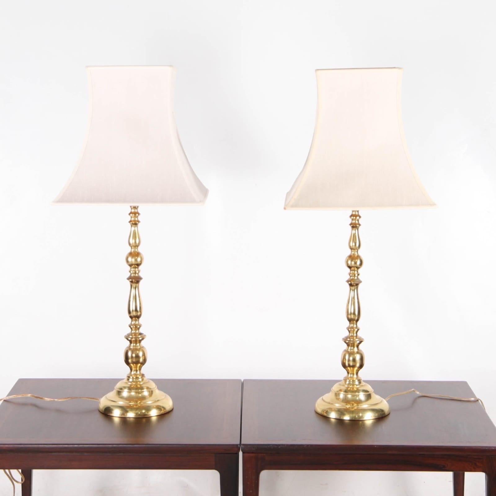 Brass Pair of large brass lamps For Sale