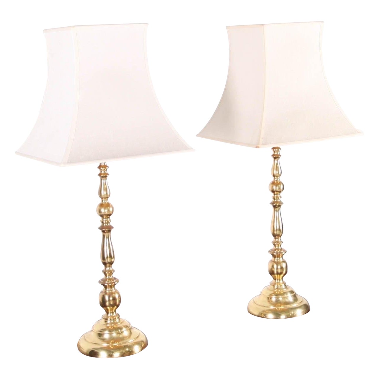 Pair of large brass lamps