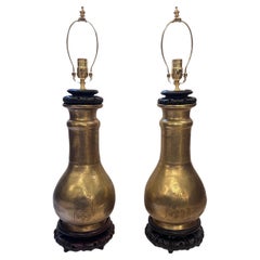 Coppia di grandi lampade in ottone