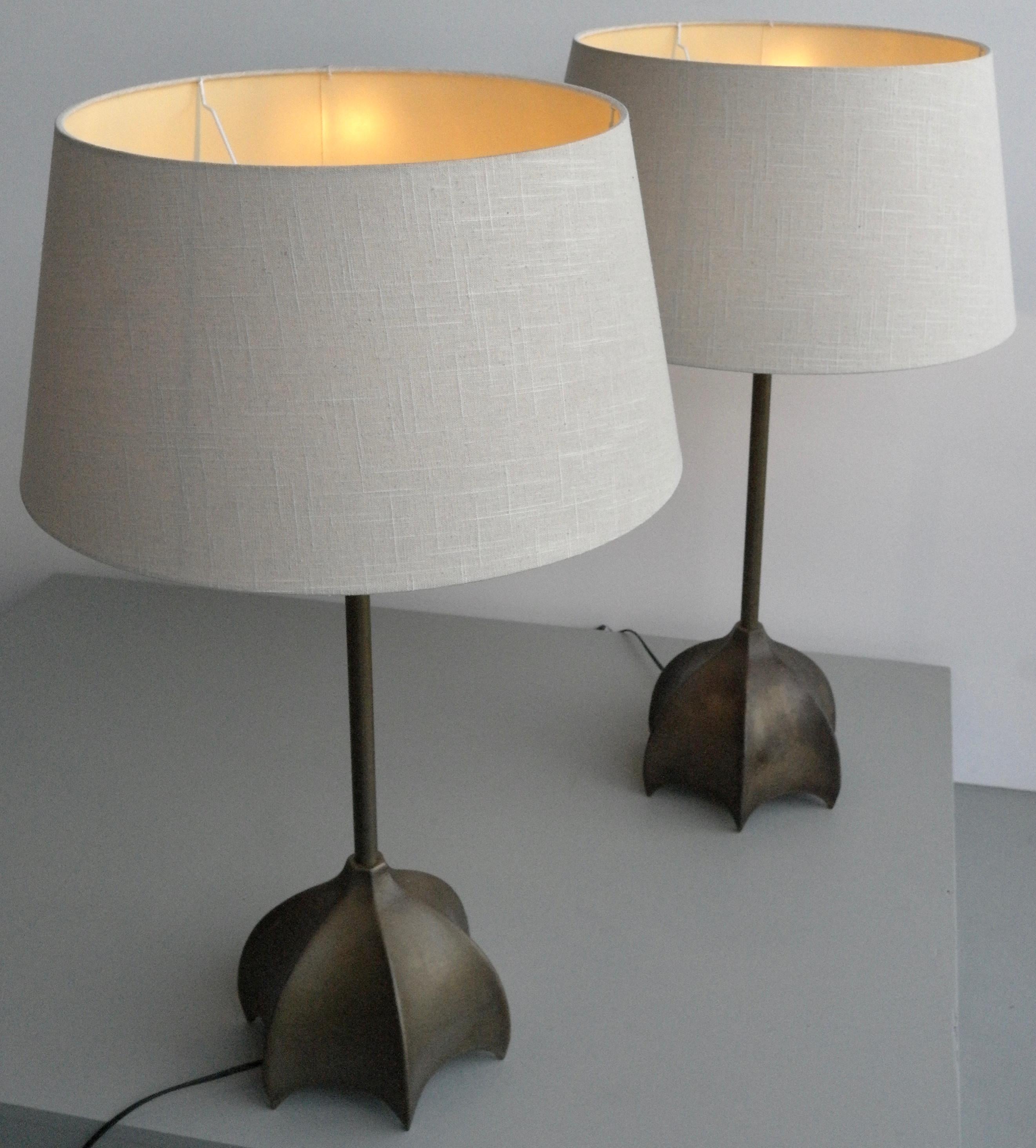 Pair of large bronze and brass table lamps, France, 1960s.