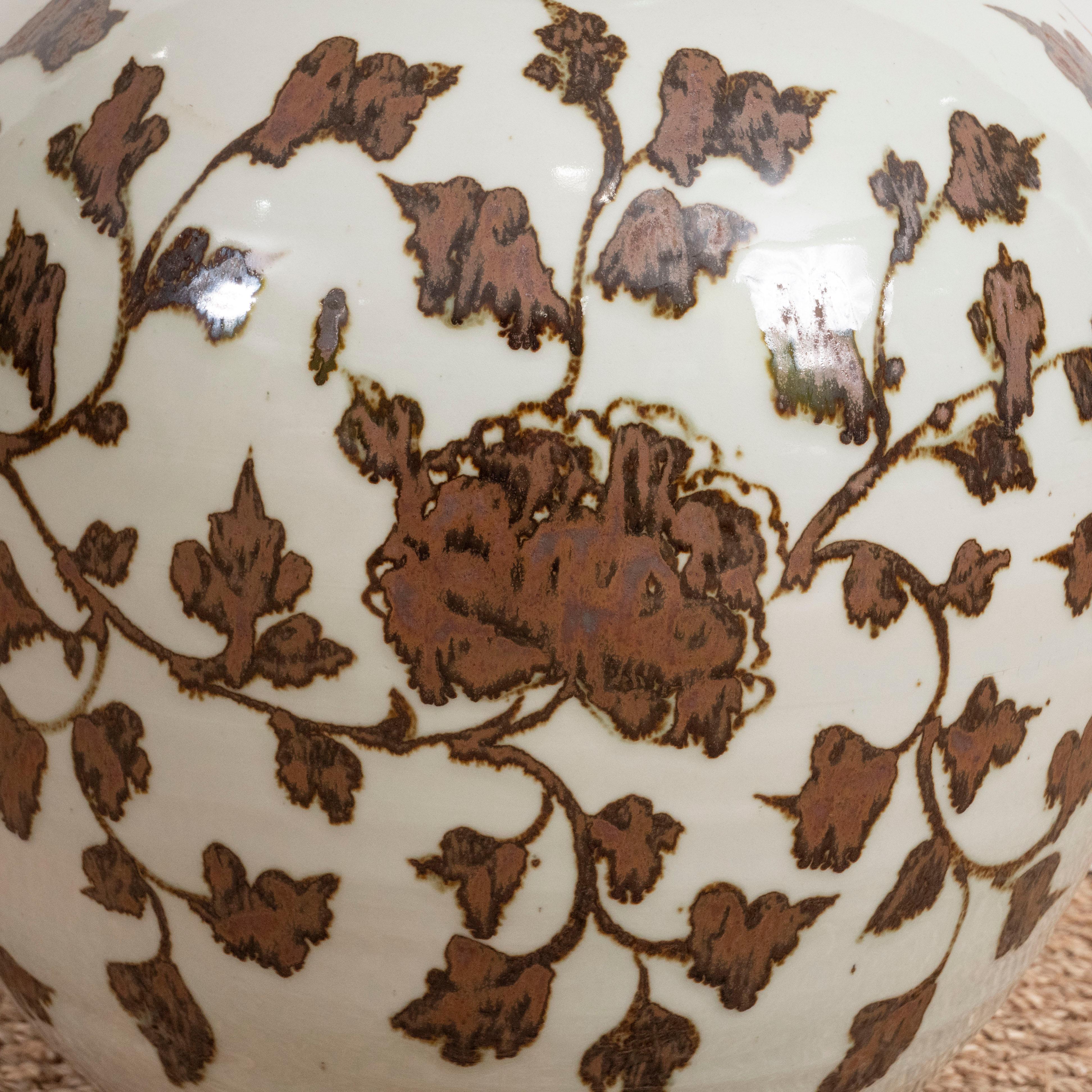 A pair of large brown and white Chinese Export porcelain vases with leaf design.
