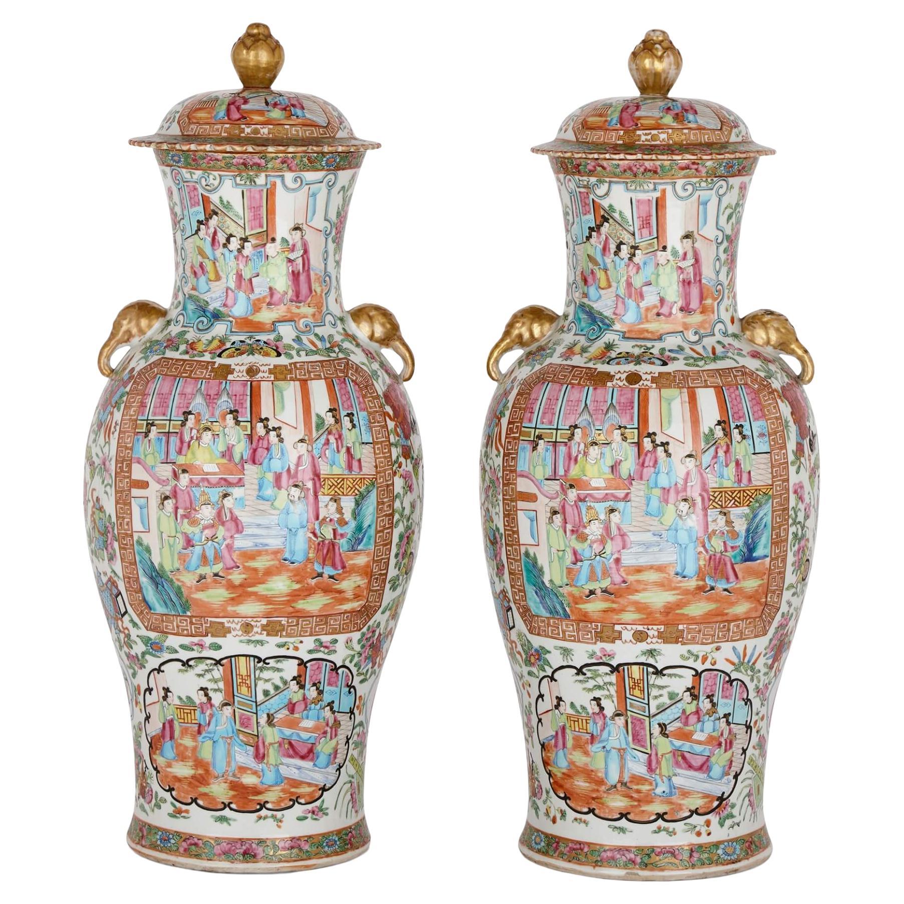 Pair of Large Canton Style Famille Rose Porcelain Vases and Covers