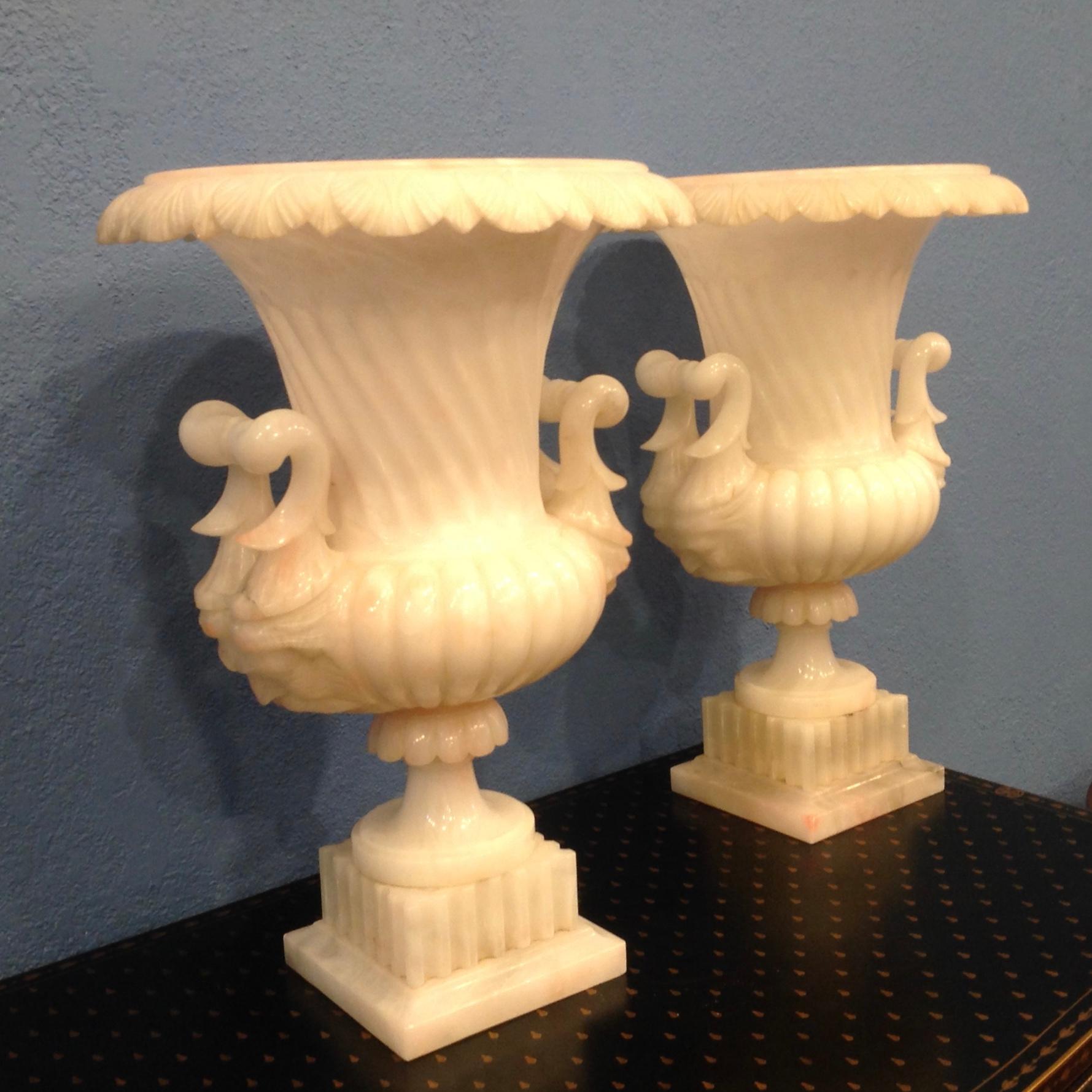 Sensational quality and design.
The urns are fluted and ribbed; and the handles are appointed with faces.