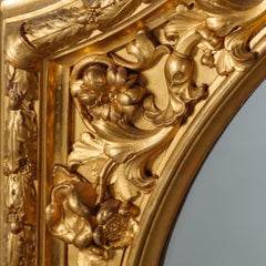 Pair of Large Carved Giltwood and Gesso Mirrors