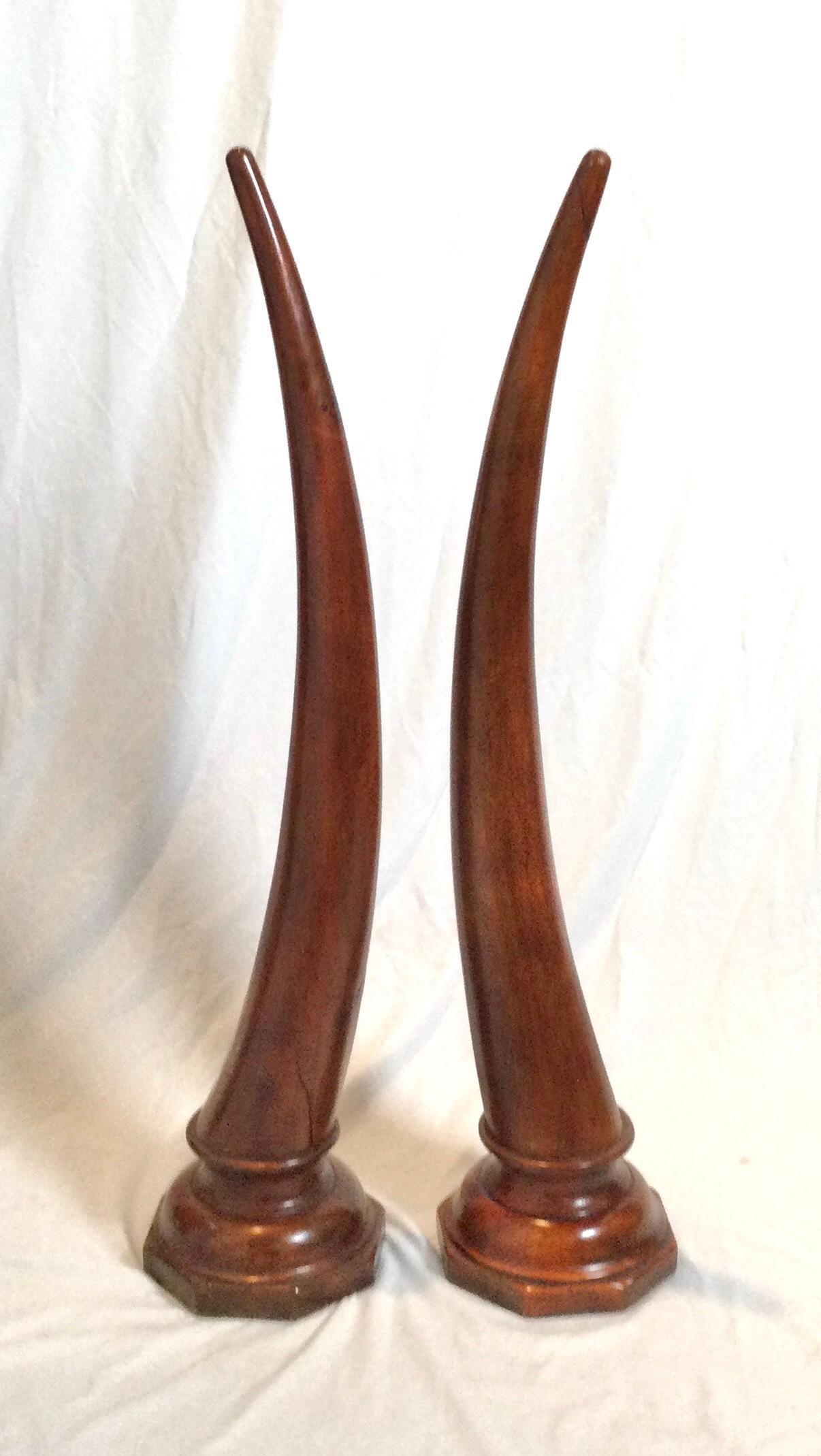 Unknown Pair of Large Carved Mahogany Tusks For Sale