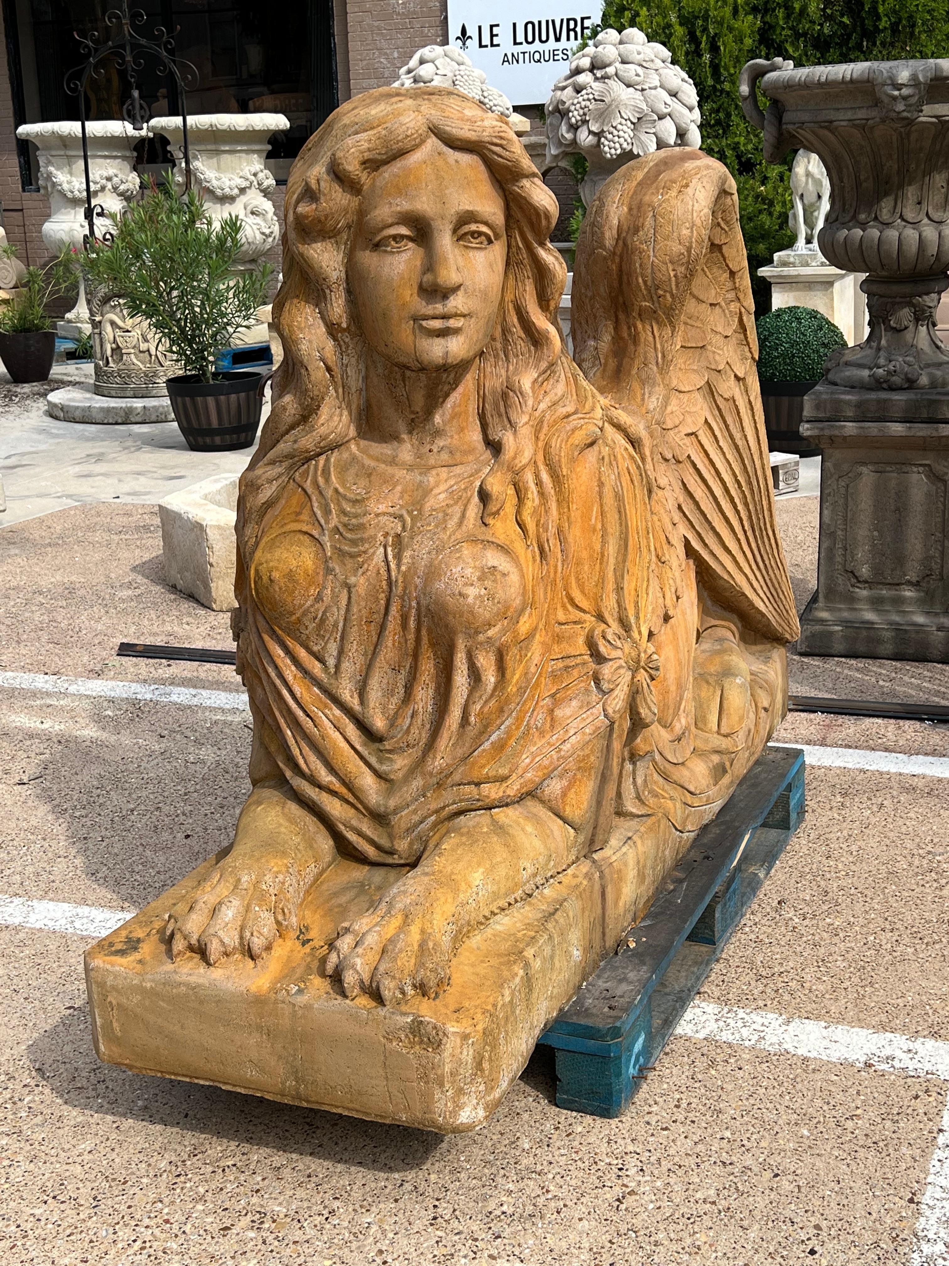 Based on ancient Greek mythology of a hybrid creature with the head of a human, the body of a lion, and the wings of an eagle, this pair of monumental sphinx statues were cast in France. The origin of the sphinx can be traced back to the Dynasty IV