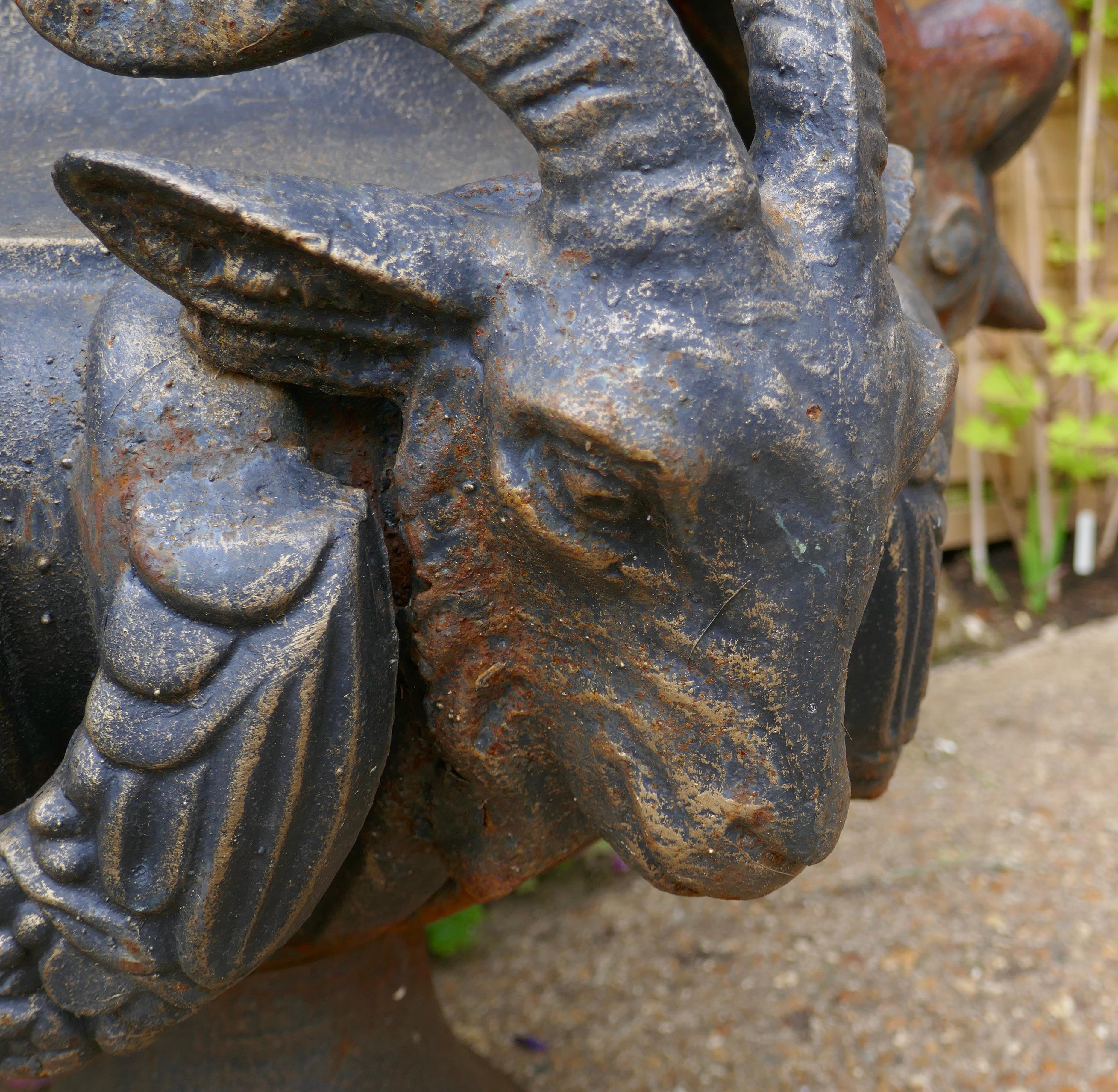 Pair of Large Cast Iron Garden Urns with Rams and Putti For Sale 1
