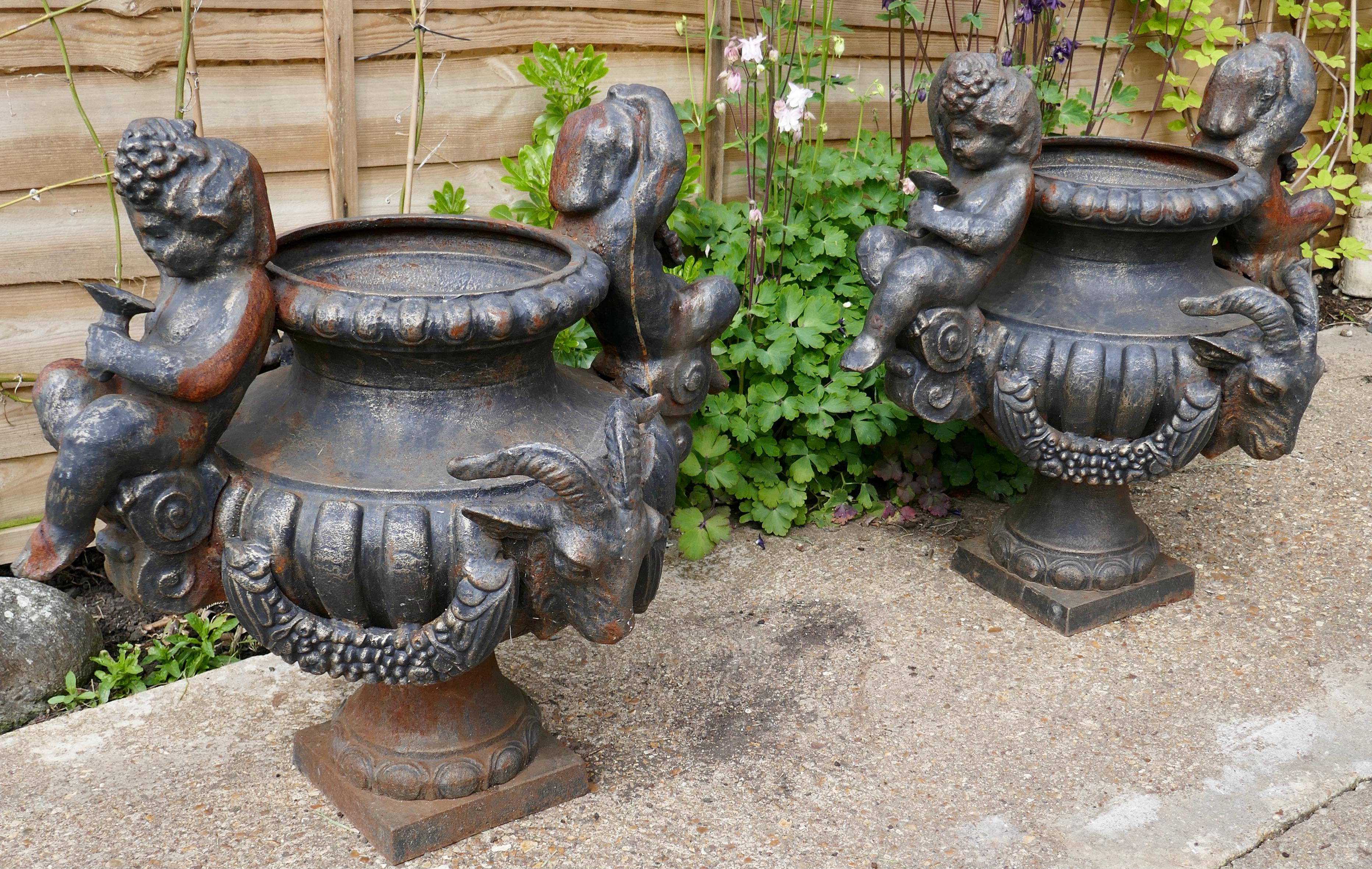 Pair of Large Cast Iron Garden Urns with Rams and Putti For Sale 4