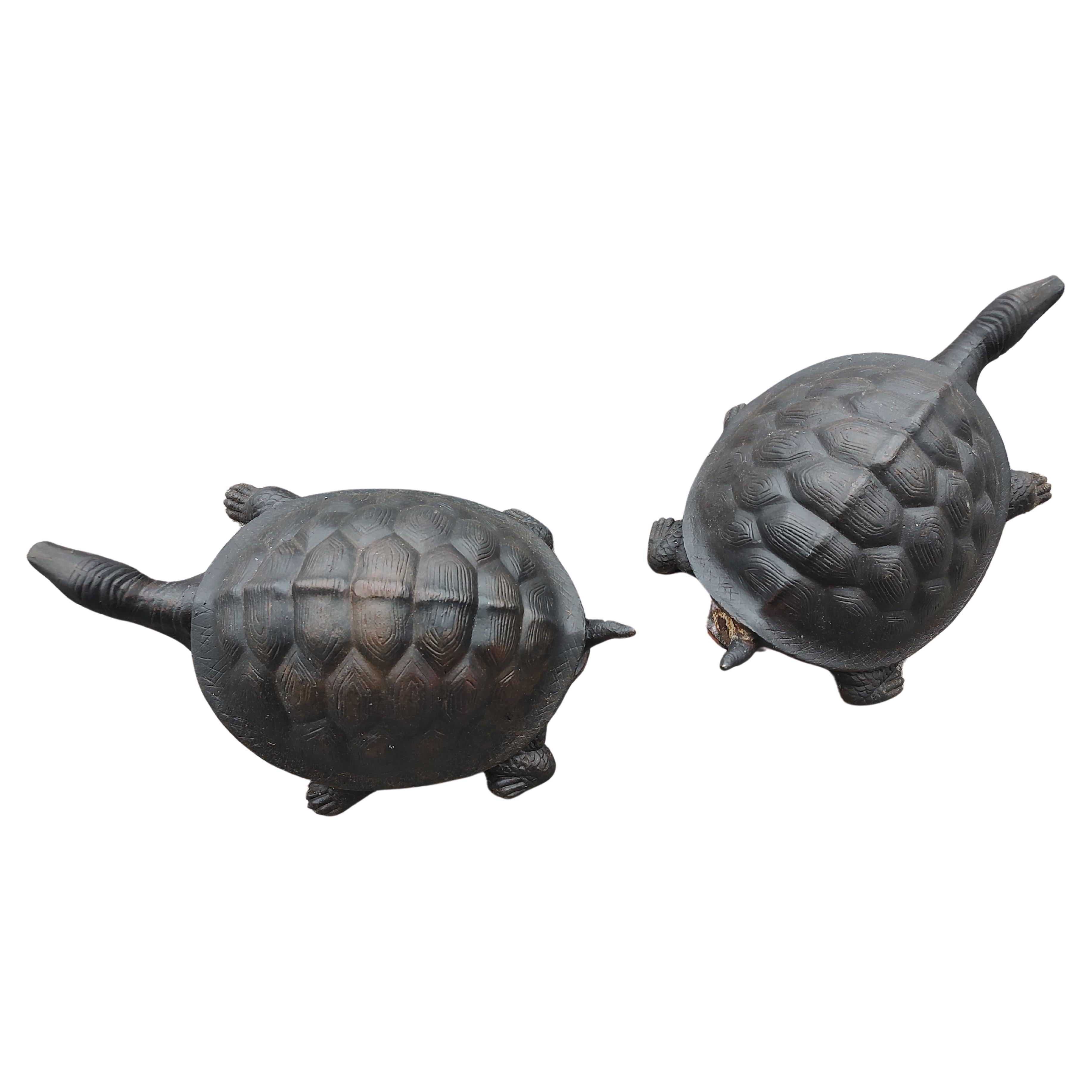 Fabulous pair of cast iron garden turtle fountains. Each turtle measures at 25 x 14 x 10h inches. Hefty in weight, very stable. Copper tubing for the water spout. Great detailed castings and in wonderful condition. Priced and sold individually.