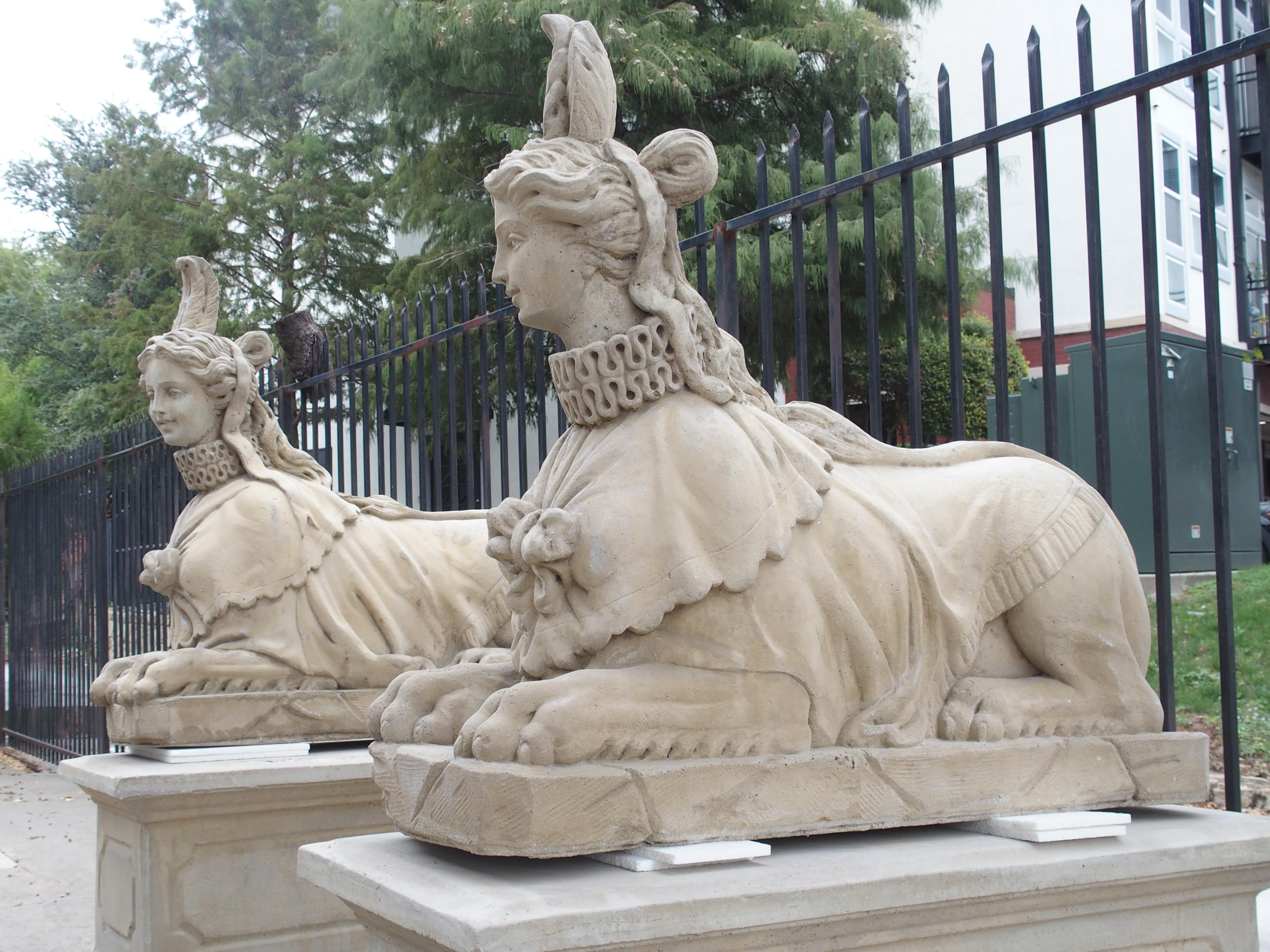 Pair of Large Cast Stone Sphinxes on Pedestal Bases 12