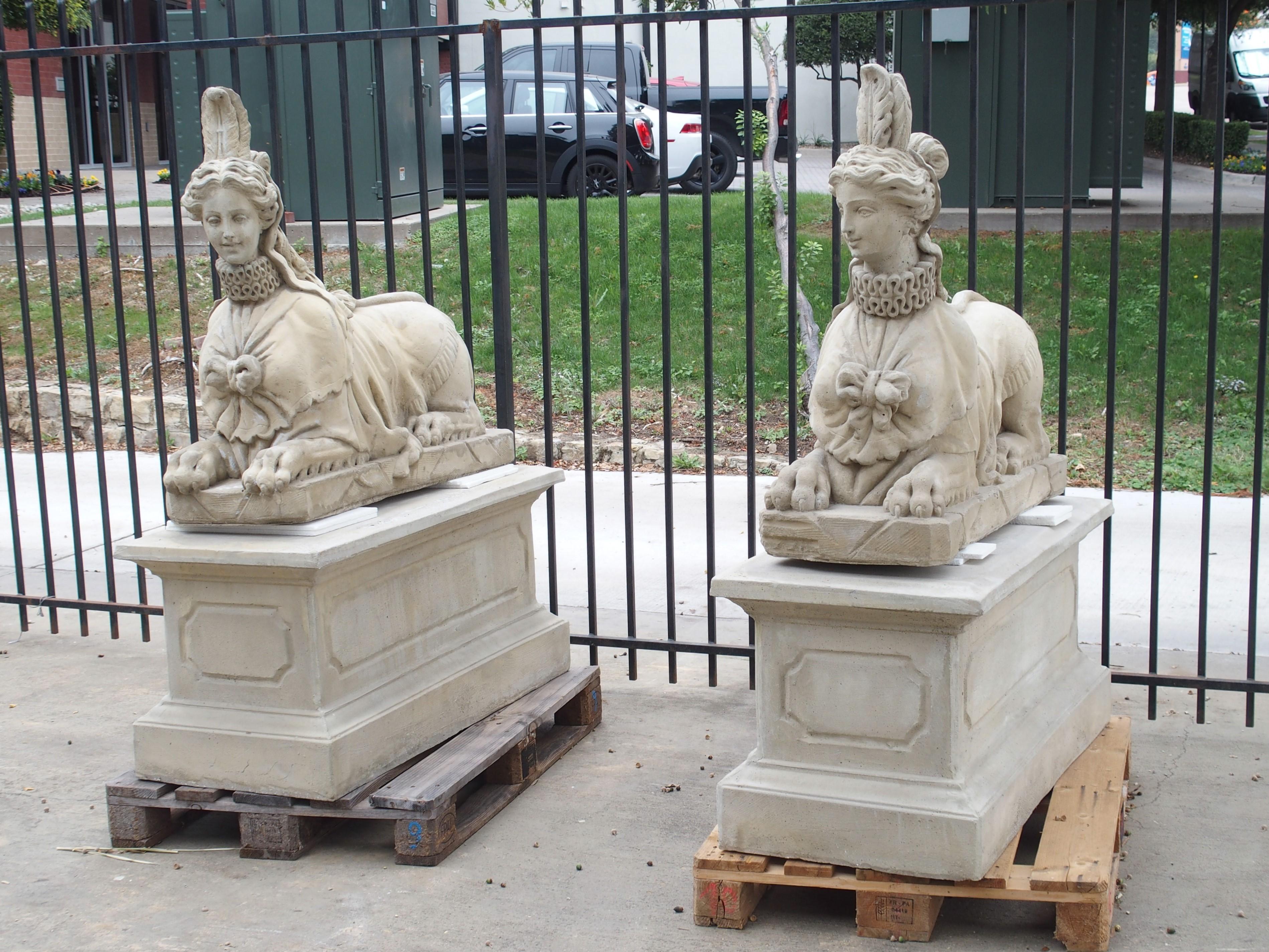Pair of Large Cast Stone Sphinxes on Pedestal Bases 13